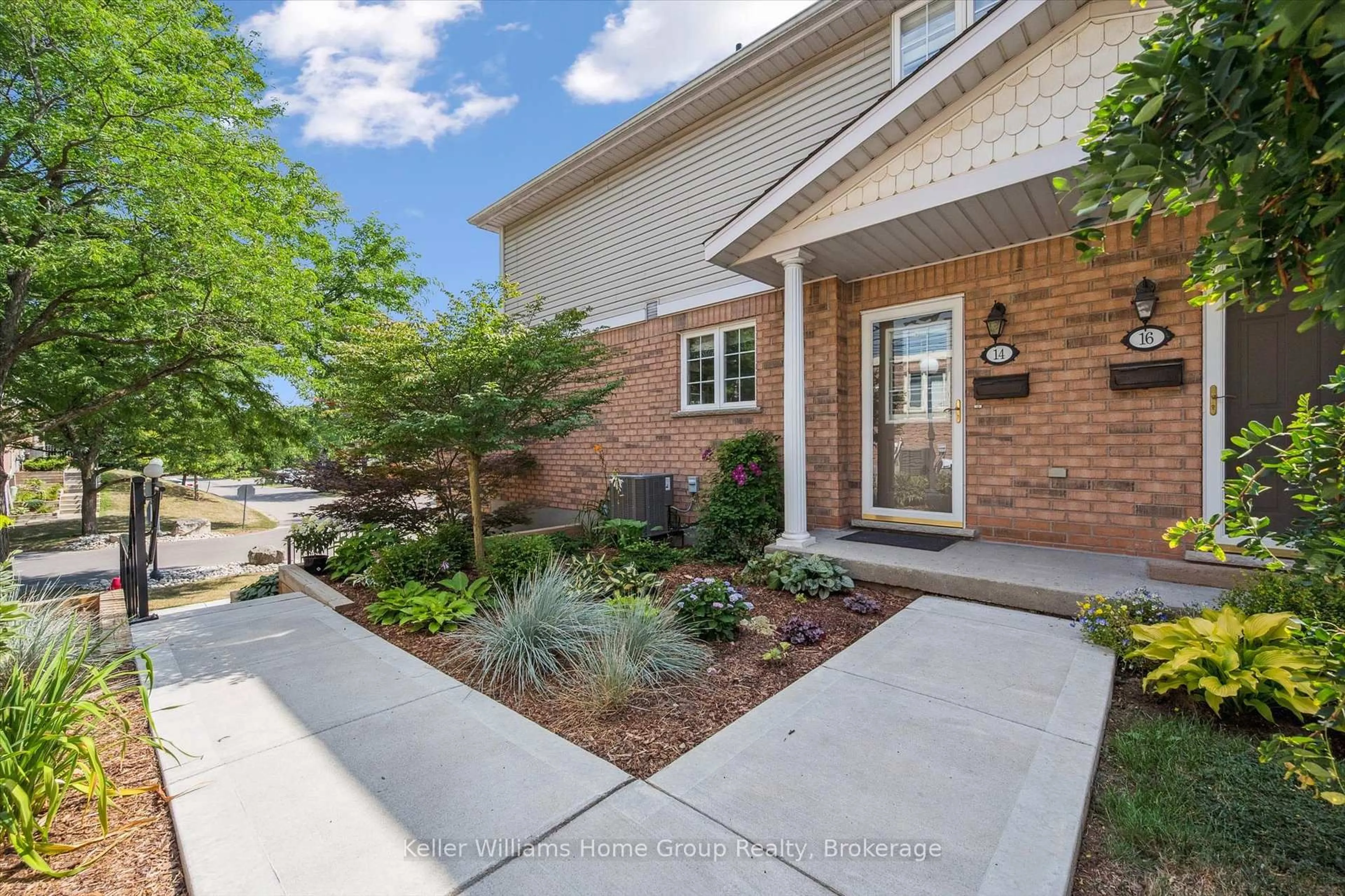 Home with brick exterior material, street for 941 Gordon St #14, Guelph Ontario N1G 4R9
