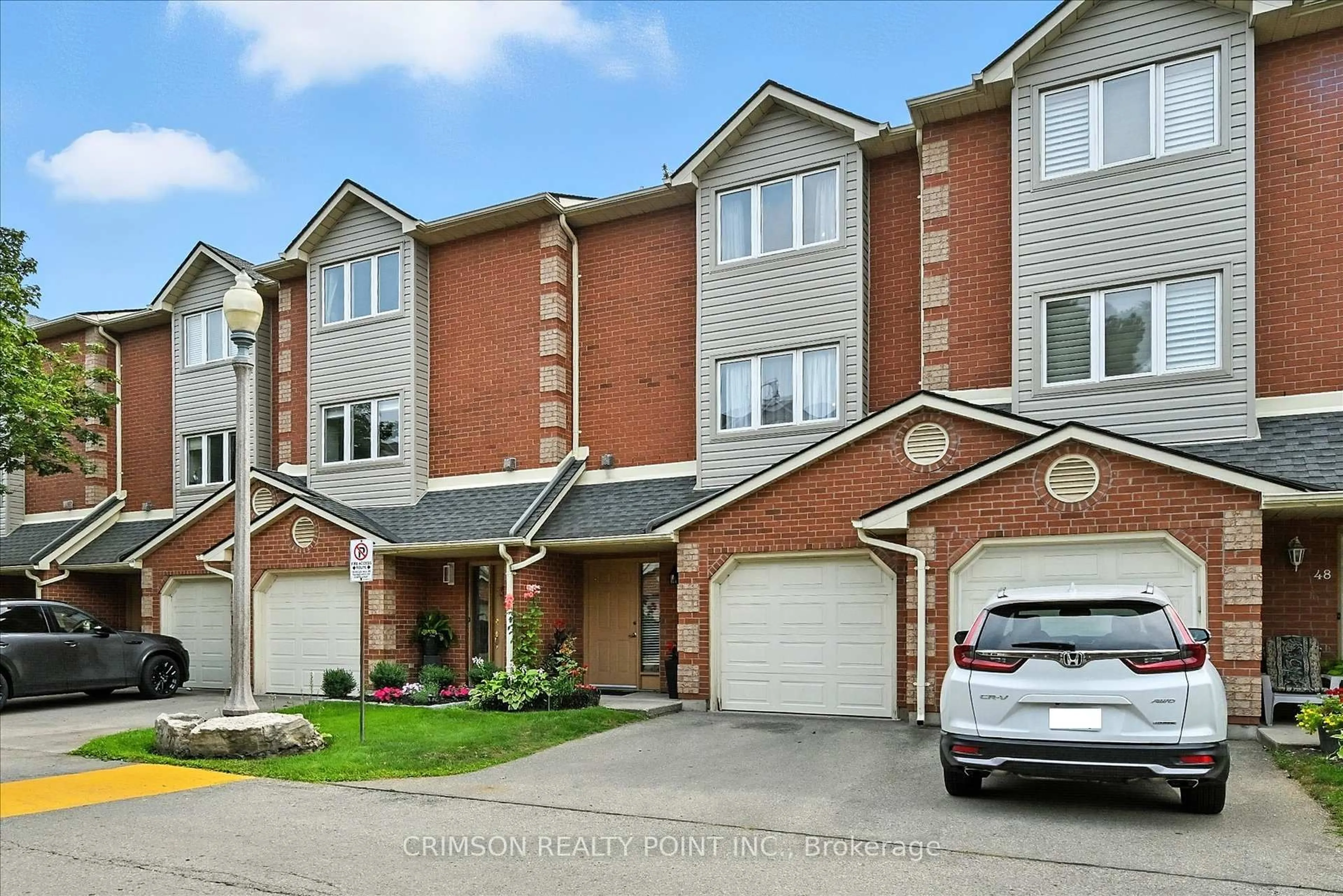 Home with brick exterior material, street for 72 Stone Church Rd #47, Hamilton Ontario L9B 2H8