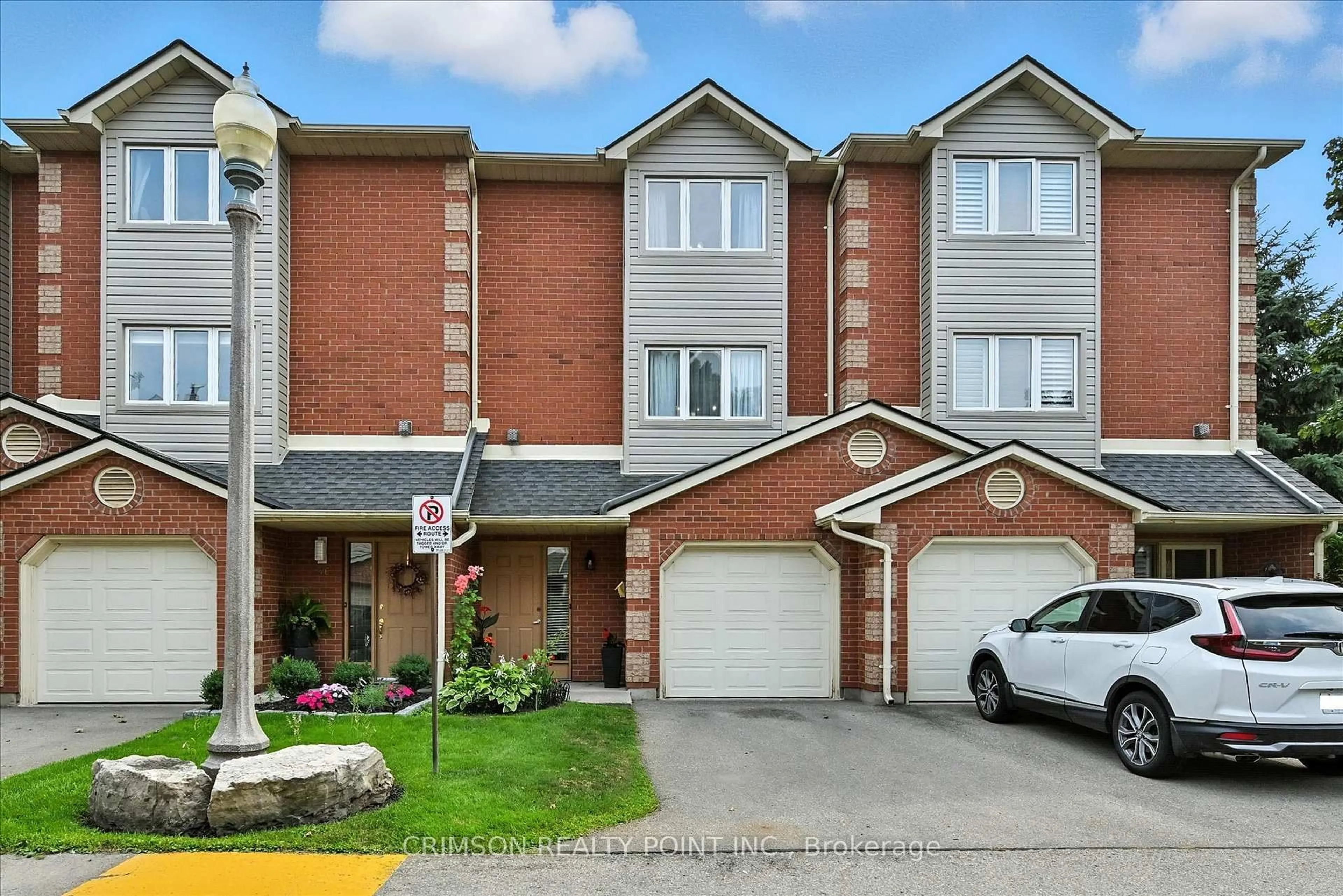 Home with brick exterior material, street for 72 Stone Church Rd #47, Hamilton Ontario L9B 2H8