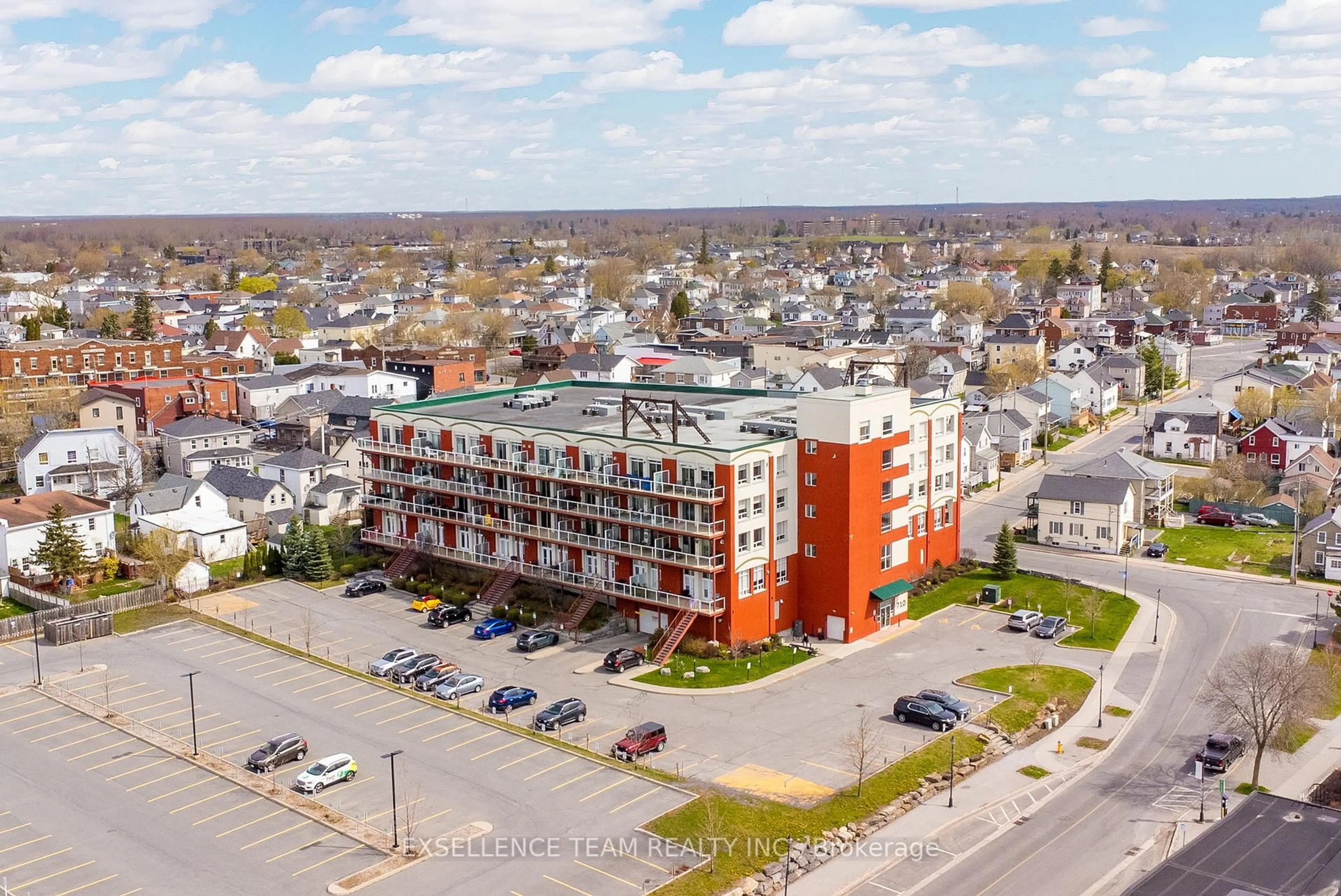 A pic from outside/outdoor area/front of a property/back of a property/a pic from drone, building for 710 Cotton Mill St #412, Cornwall Ontario K6H 7L3