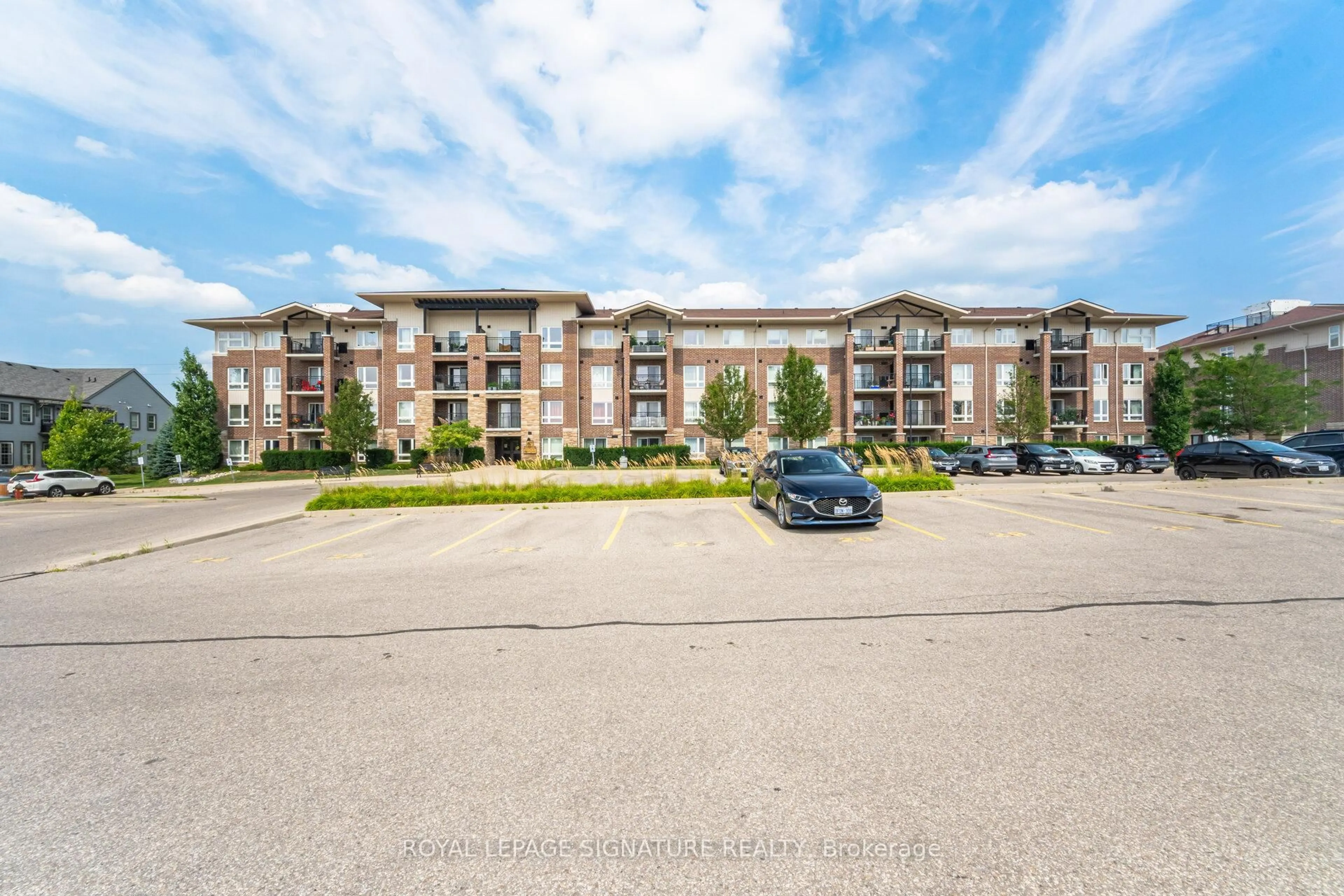 A pic from outside/outdoor area/front of a property/back of a property/a pic from drone, building for 67 Kingsbury Sq #111, Guelph Ontario N1L 0L3