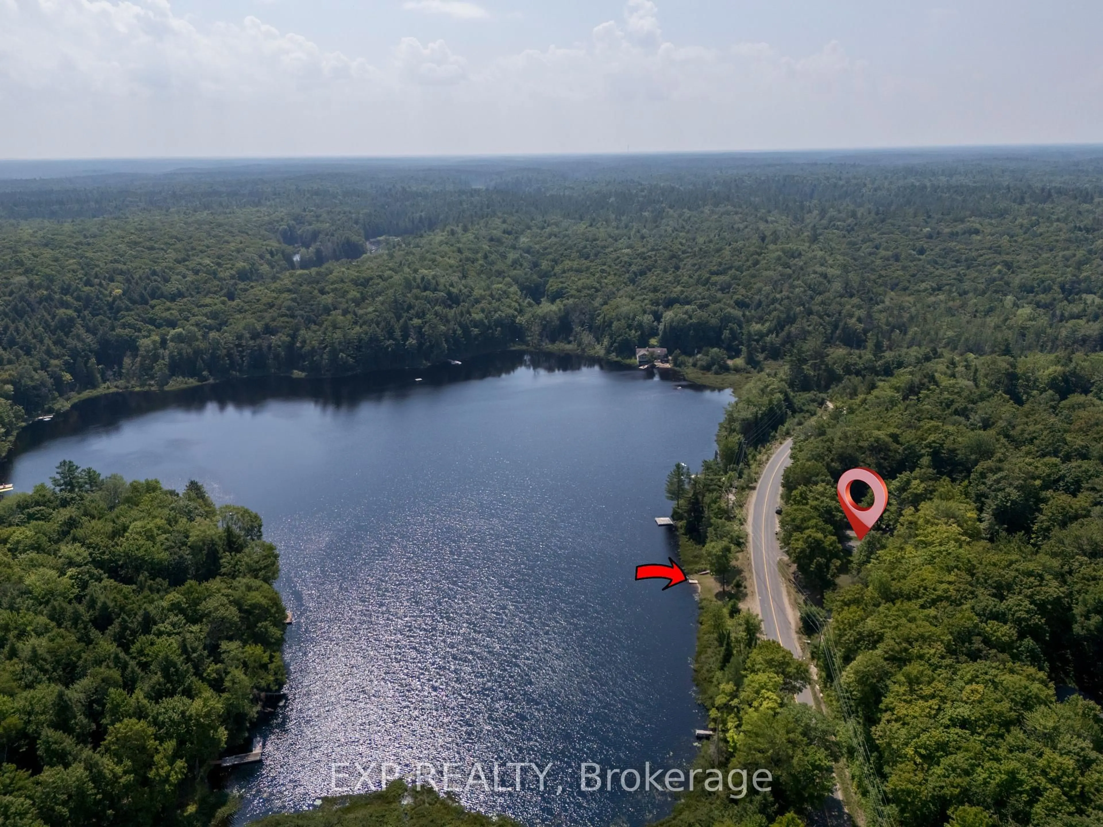 A pic from outside/outdoor area/front of a property/back of a property/a pic from drone, water/lake/river/ocean view for 1867 Fraserburg Rd, Bracebridge Ontario P1L 1X3
