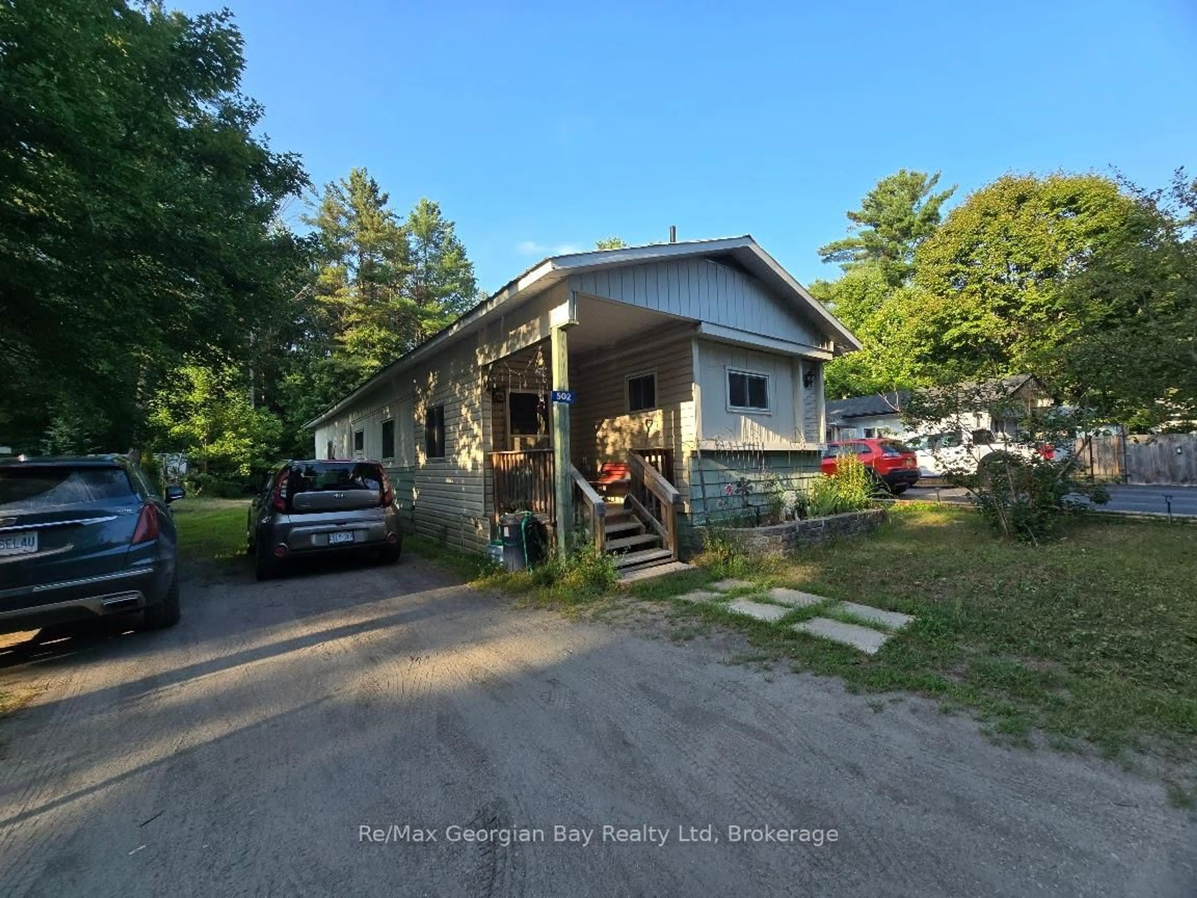 A pic from outside/outdoor area/front of a property/back of a property/a pic from drone, unknown for 1713 HIGHWAY 11 SOUTH Highway #502, Gravenhurst Ontario P0E 1G0