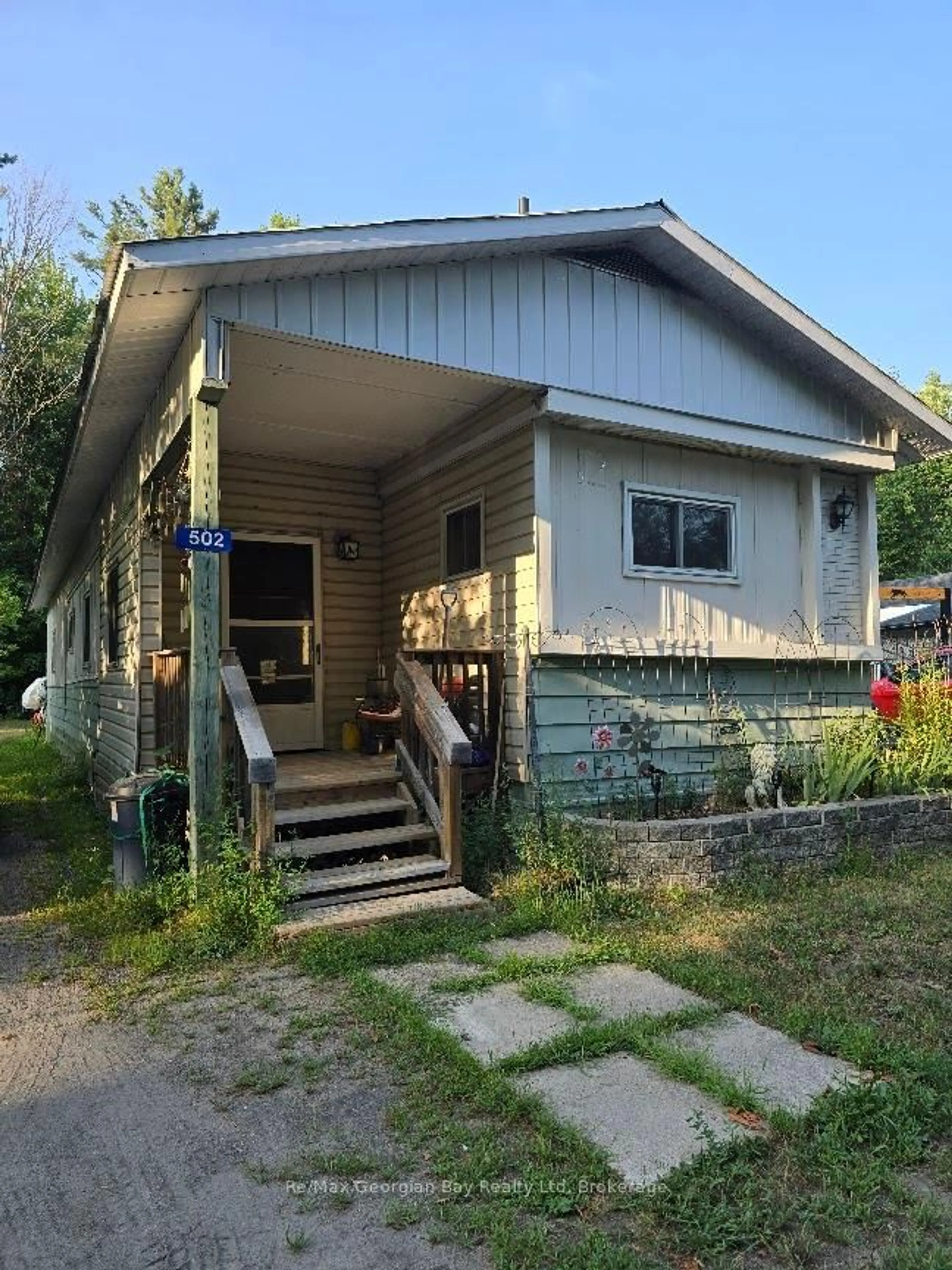 Home with vinyl exterior material, street for 1713 HIGHWAY 11 SOUTH Highway #502, Gravenhurst Ontario P0E 1G0