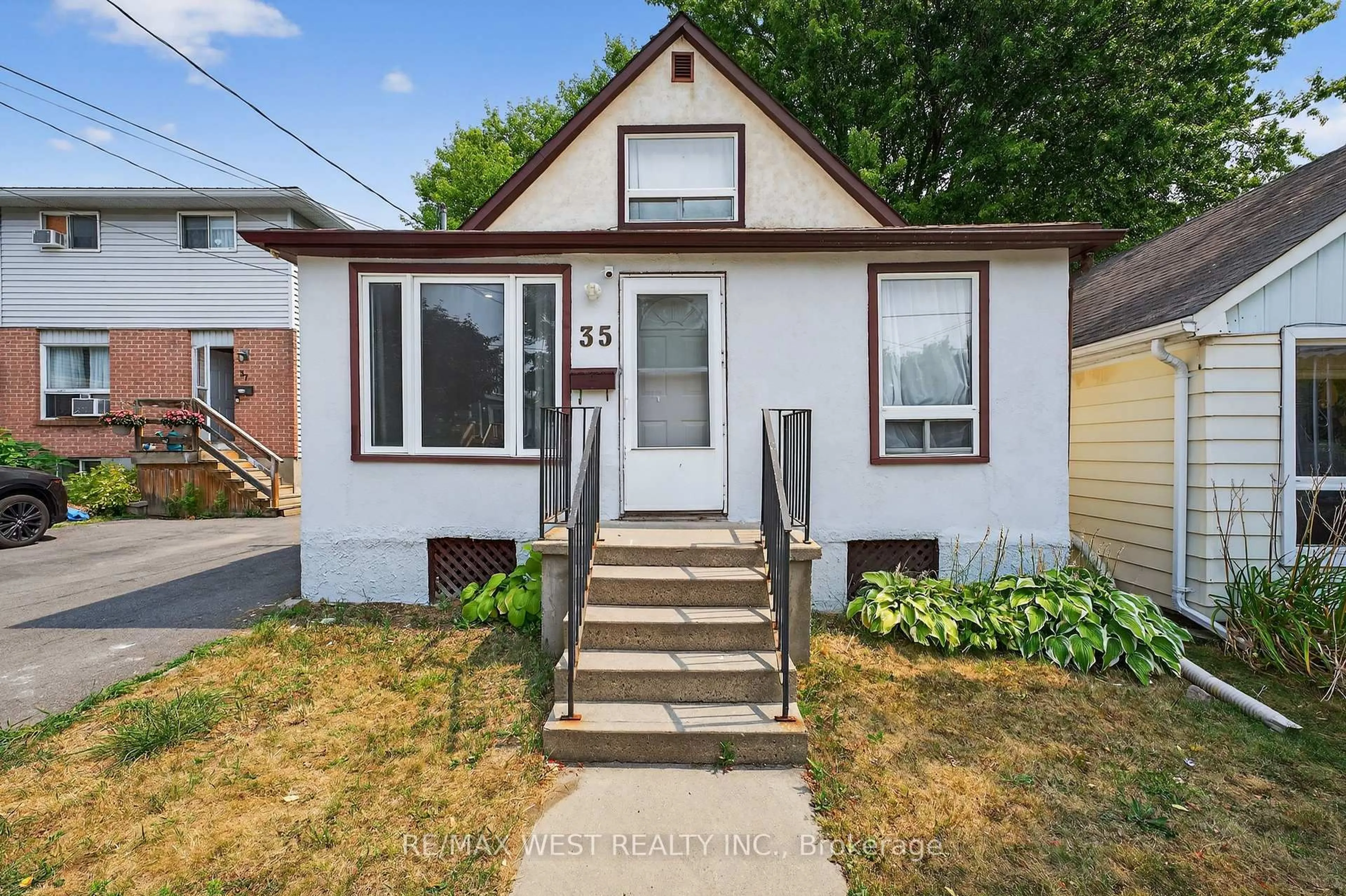 Home with vinyl exterior material, street for 35 Kingscourt Ave, Kingston Ontario K7K 4N6