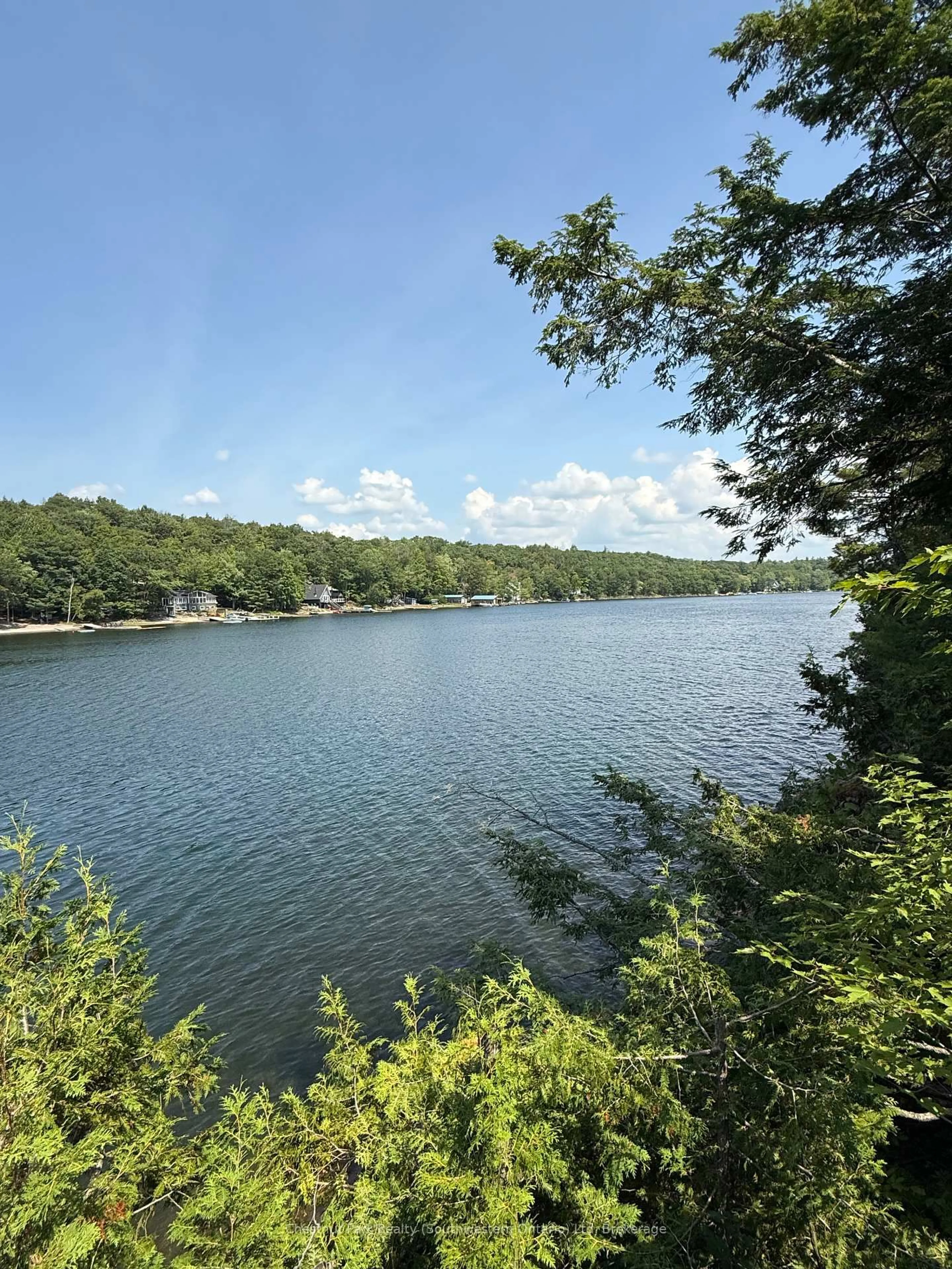 A pic from outside/outdoor area/front of a property/back of a property/a pic from drone, water/lake/river/ocean view for 3228 Twelve Mile Bay Rd, Georgian Bay Ontario P0C 1H0