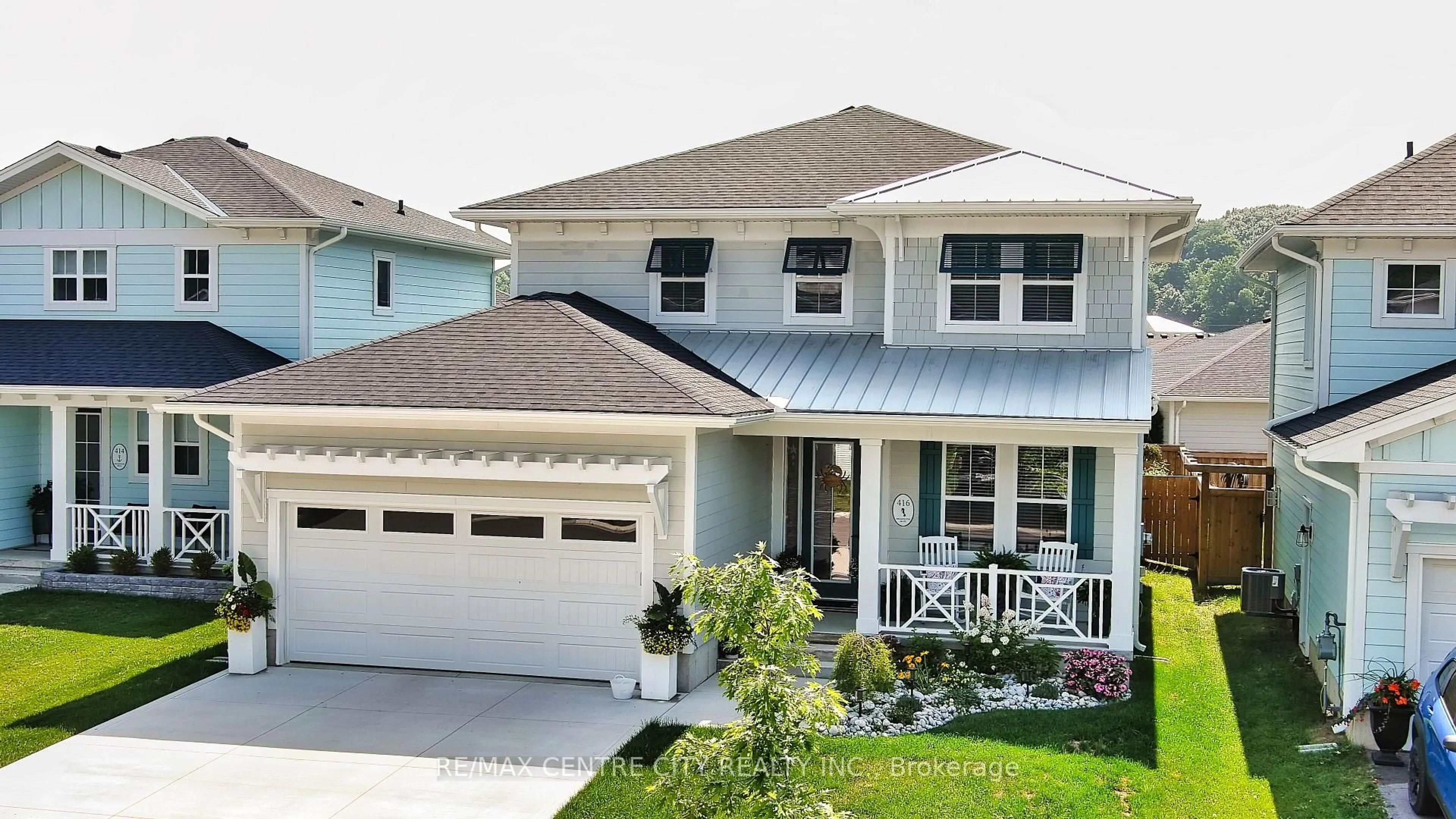 Home with vinyl exterior material, street for 416 Breakwater Blvd, Central Elgin Ontario N5L 0B5