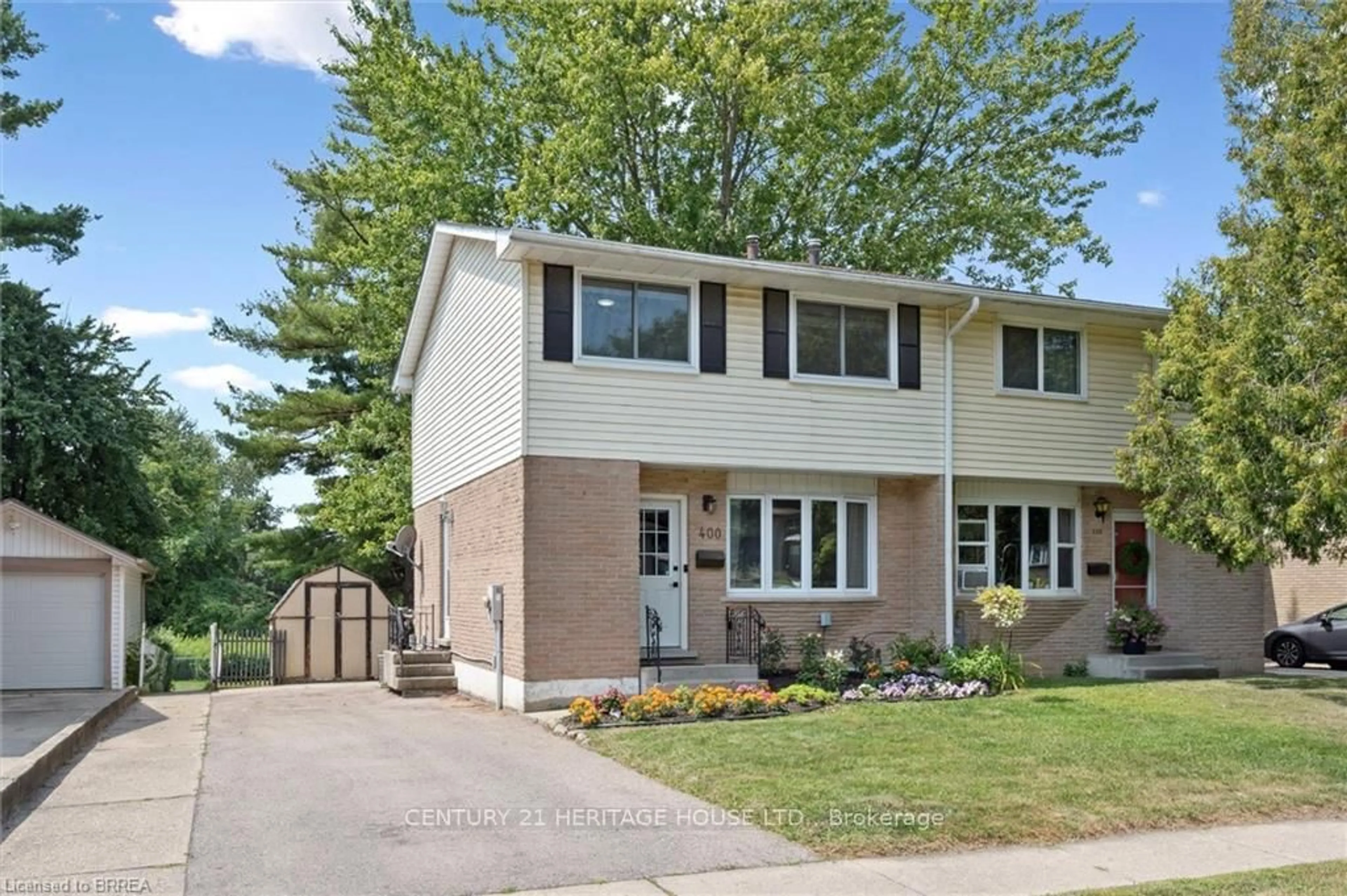 Home with vinyl exterior material, street for 400 Odlum Dr, Woodstock Ontario N4S 3S2