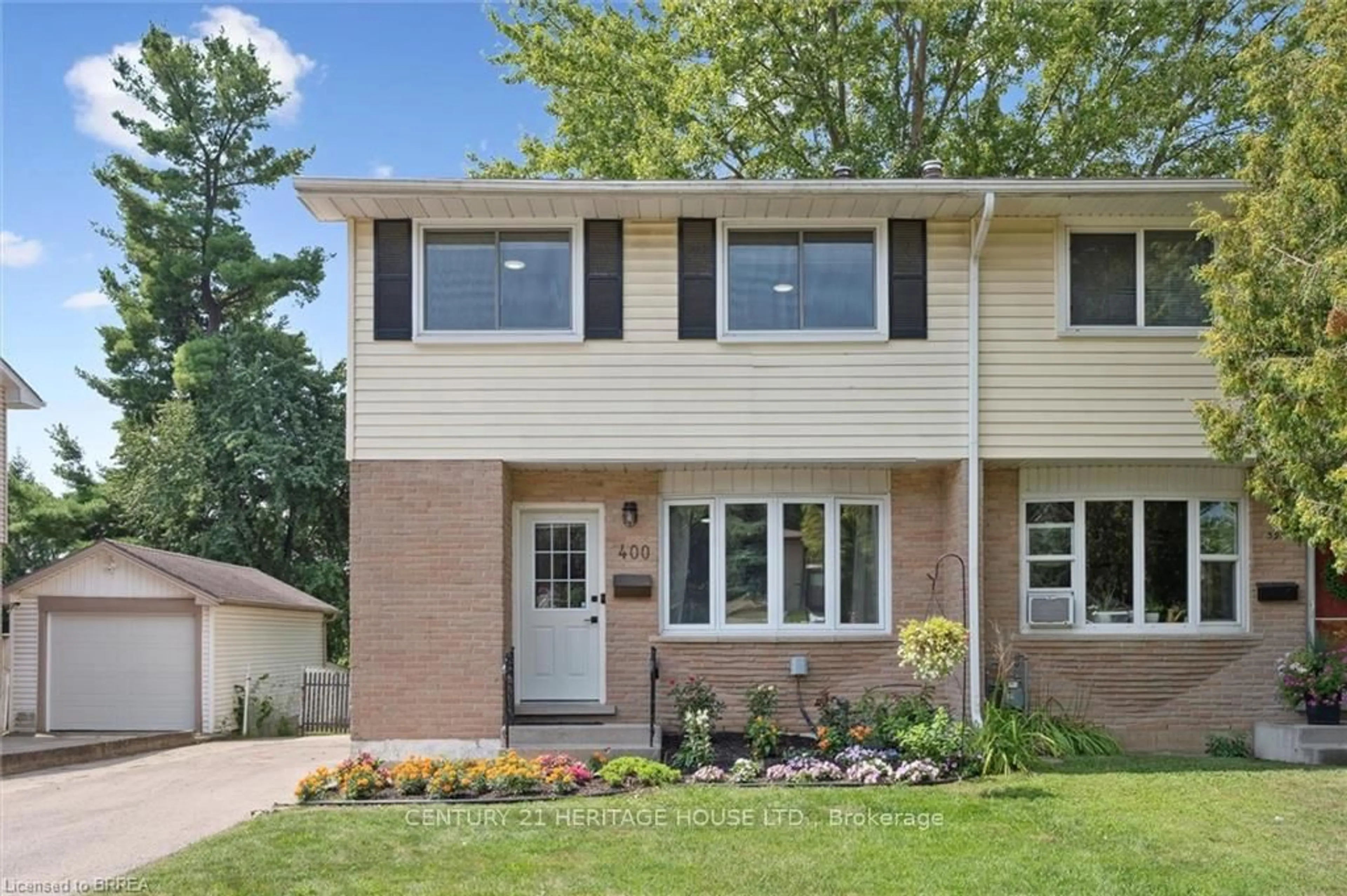 Home with brick exterior material, street for 400 Odlum Dr, Woodstock Ontario N4S 3S2