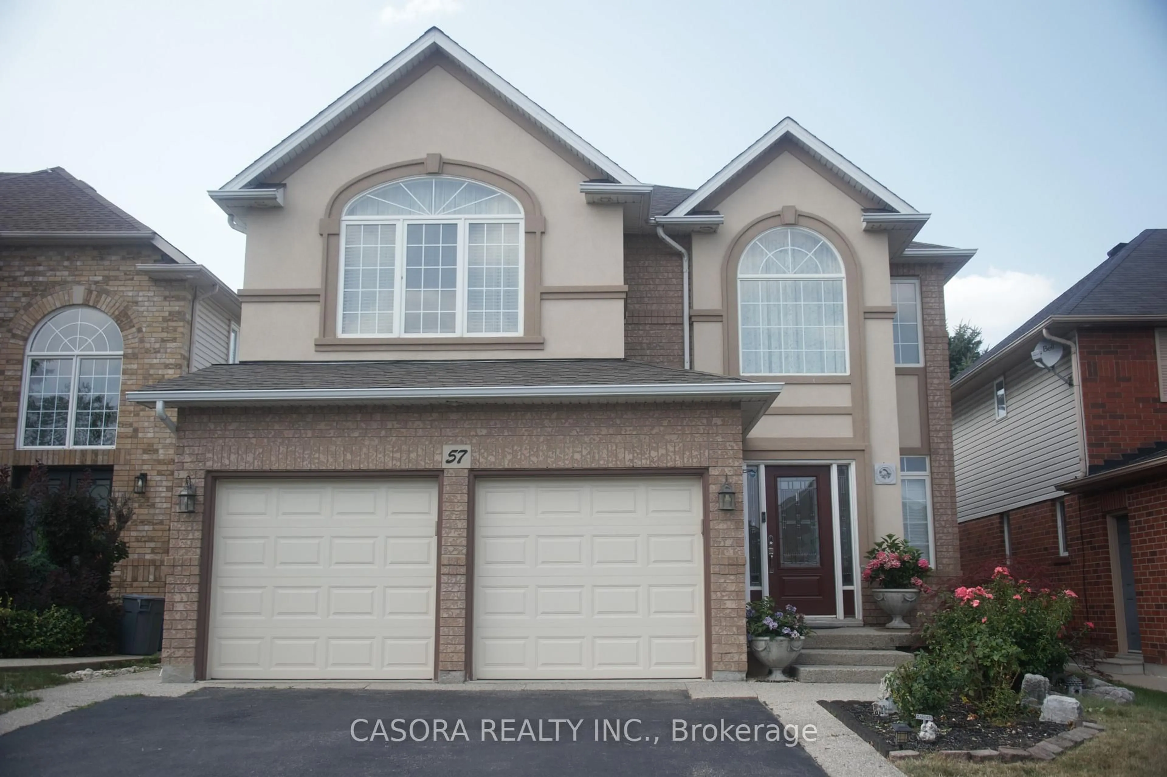 Home with vinyl exterior material, street for 57 Yorkshire Dr, Hamilton Ontario L9K 1M4