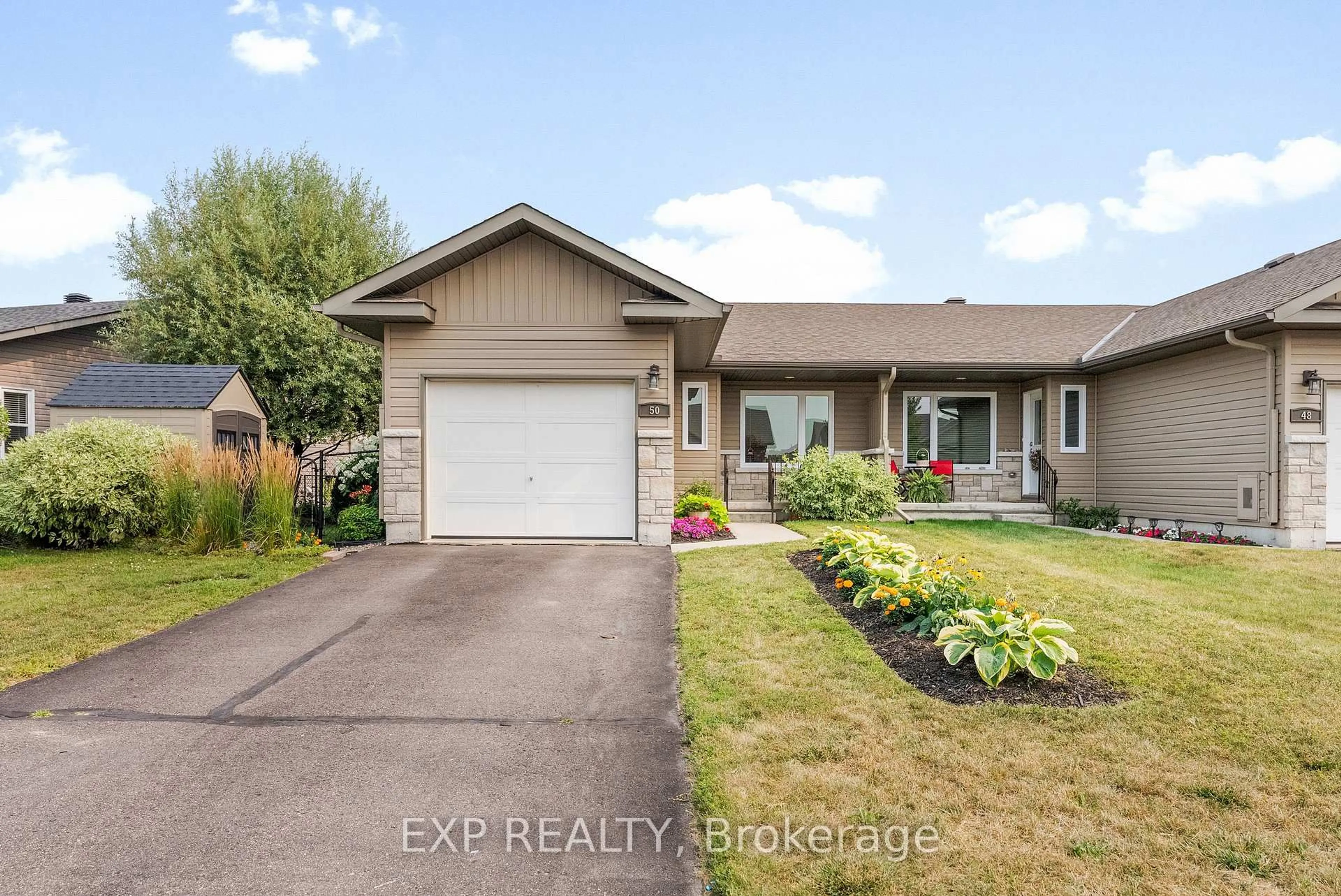 Home with vinyl exterior material, street for 50 Otteridge Ave, Renfrew Ontario K7V 0A1