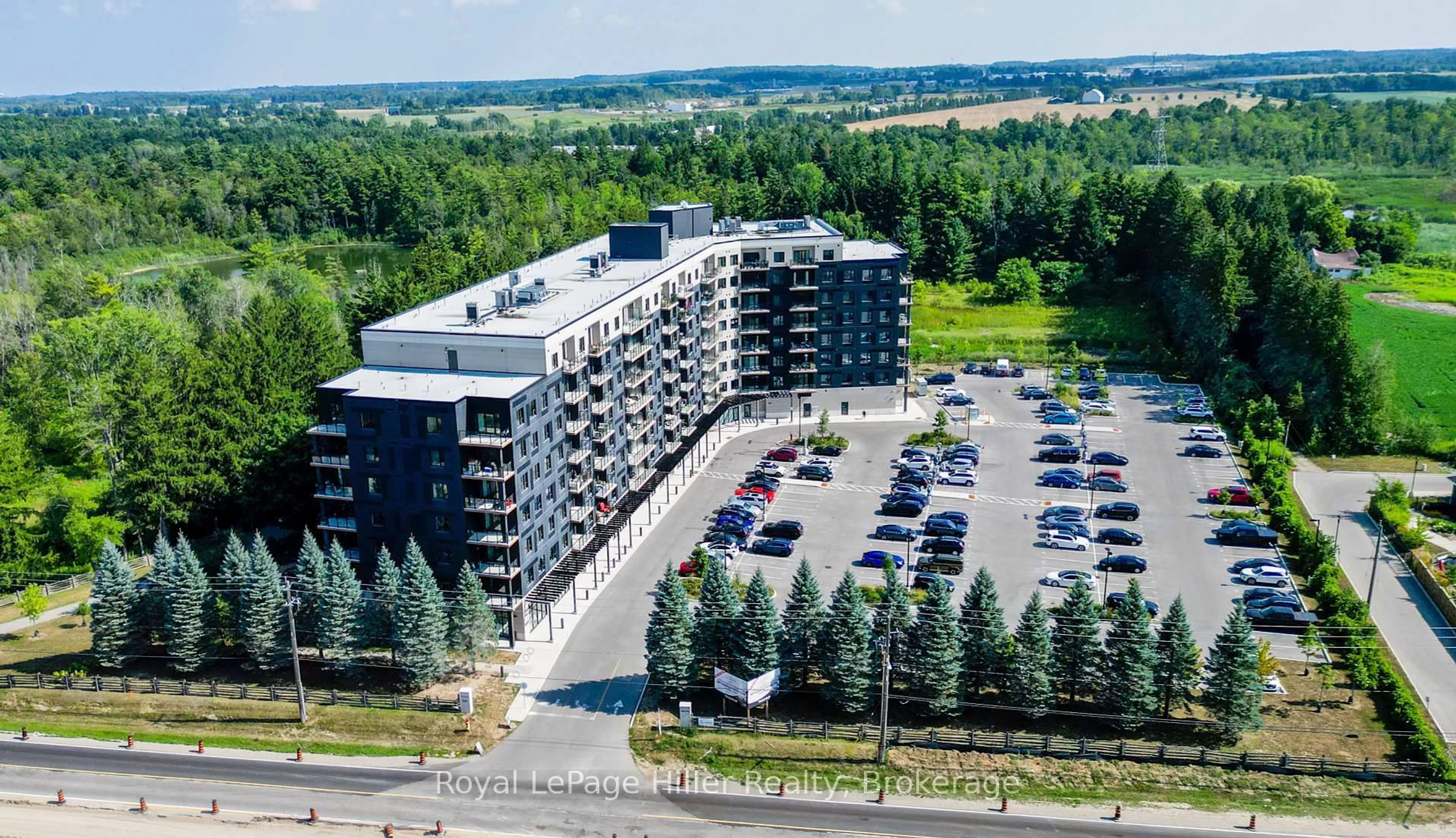 A pic from outside/outdoor area/front of a property/back of a property/a pic from drone, building for 525 New Dundee Rd #319, Kitchener Ontario N2P 0K8
