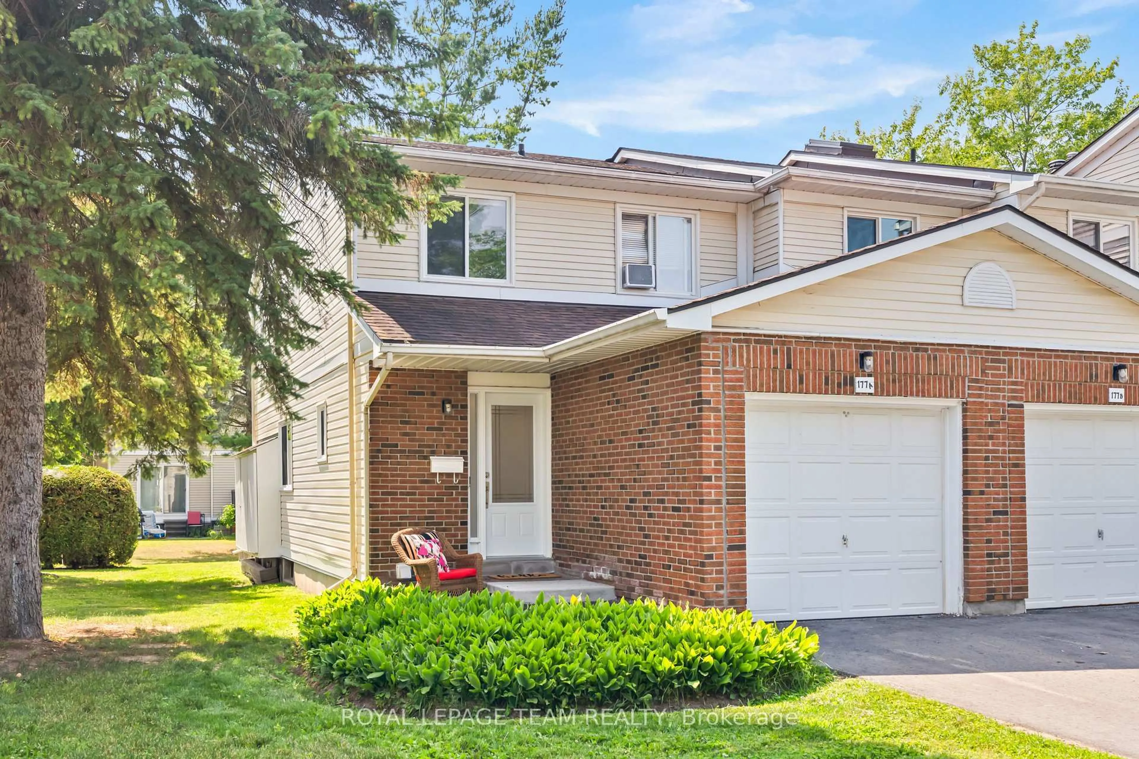 Home with brick exterior material, street for 177 Valley Stream Dr #A, Ottawa Ontario K2H 9C7