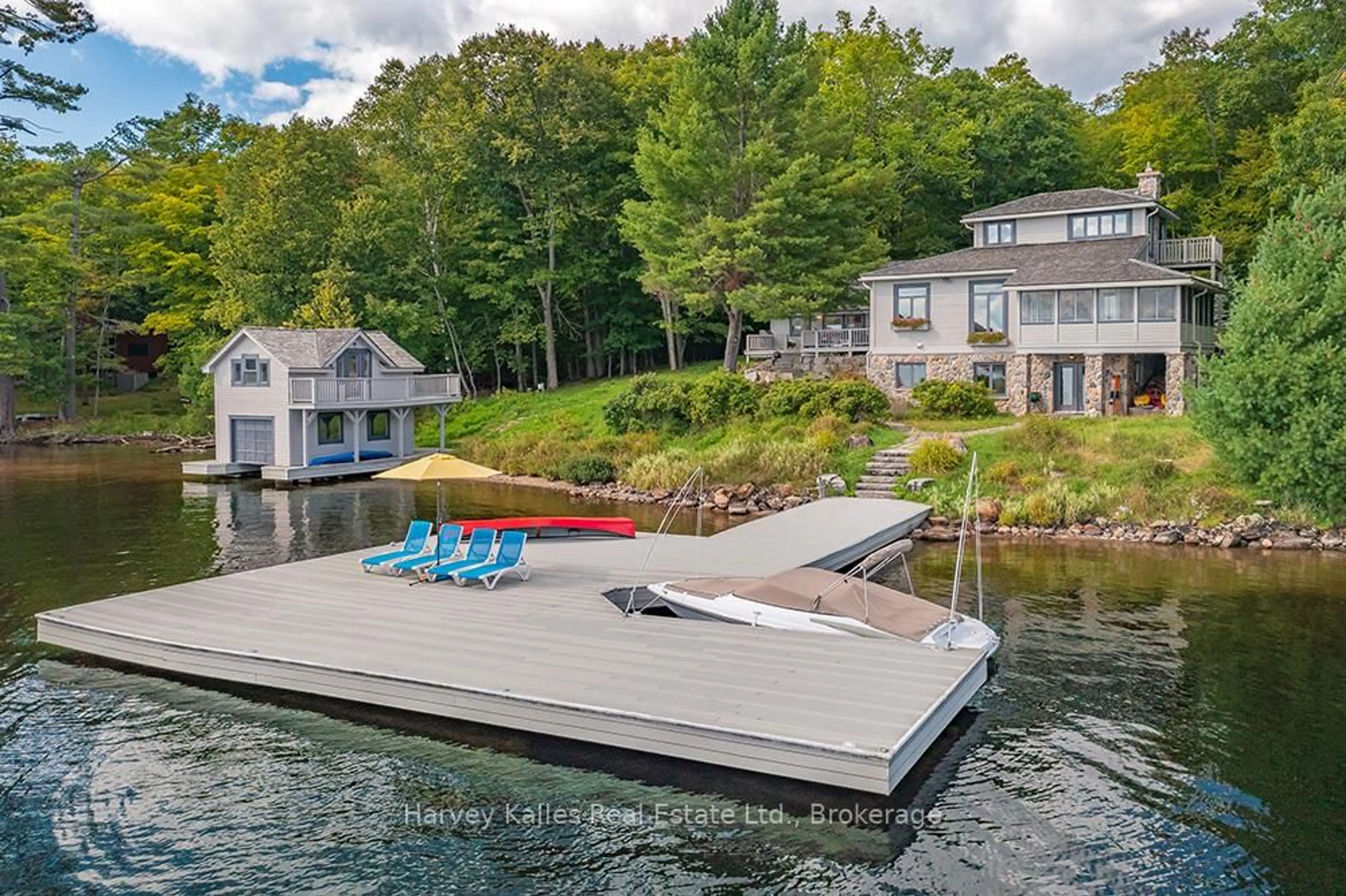 A pic from outside/outdoor area/front of a property/back of a property/a pic from drone, water/lake/river/ocean view for 1837 Port Cunnington Rd, Lake of Bays Ontario P0A 1H0
