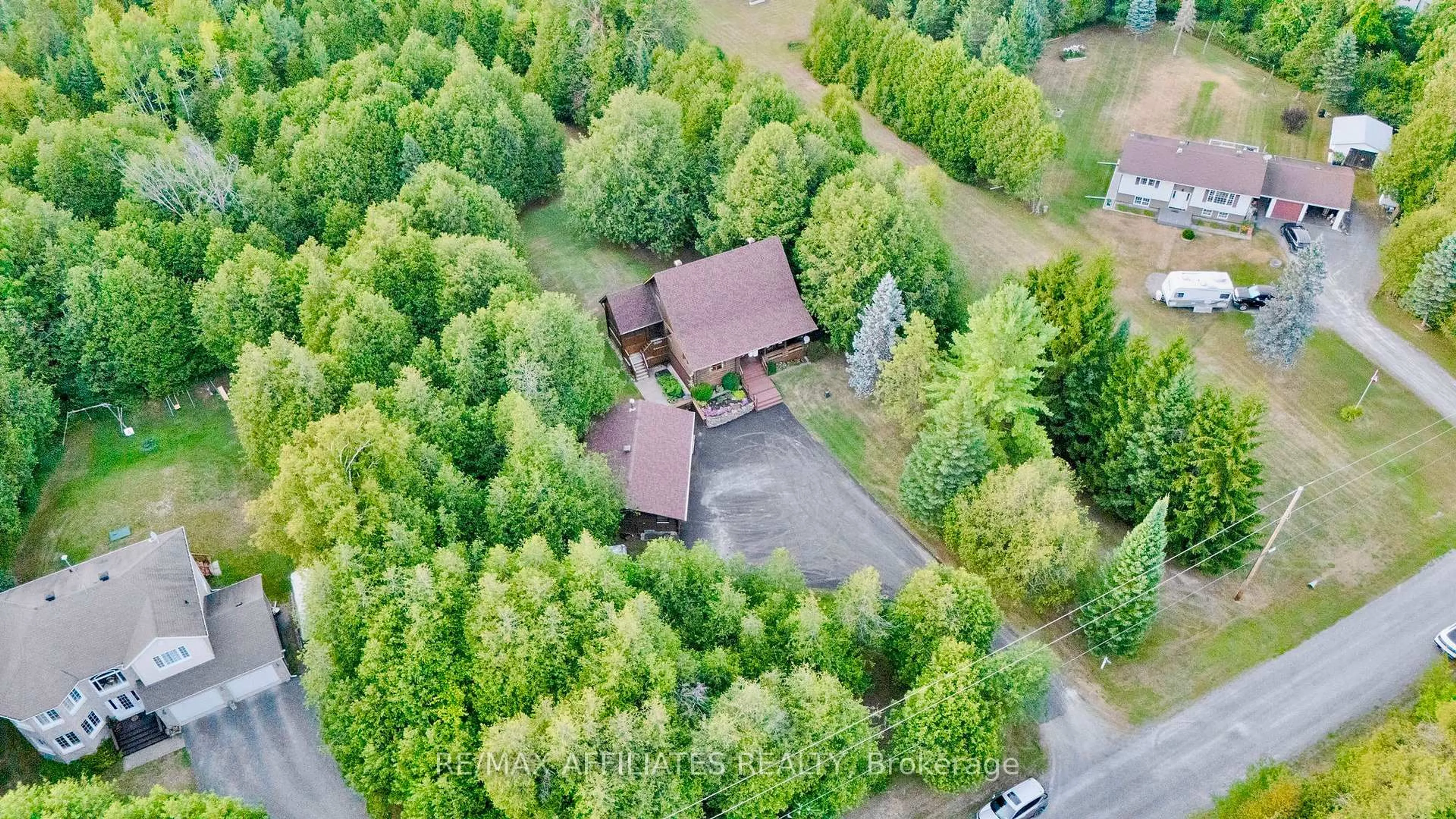 A pic from outside/outdoor area/front of a property/back of a property/a pic from drone, forest/trees view for 256 Saunders Rd, Ashton Ontario K0A 1B0