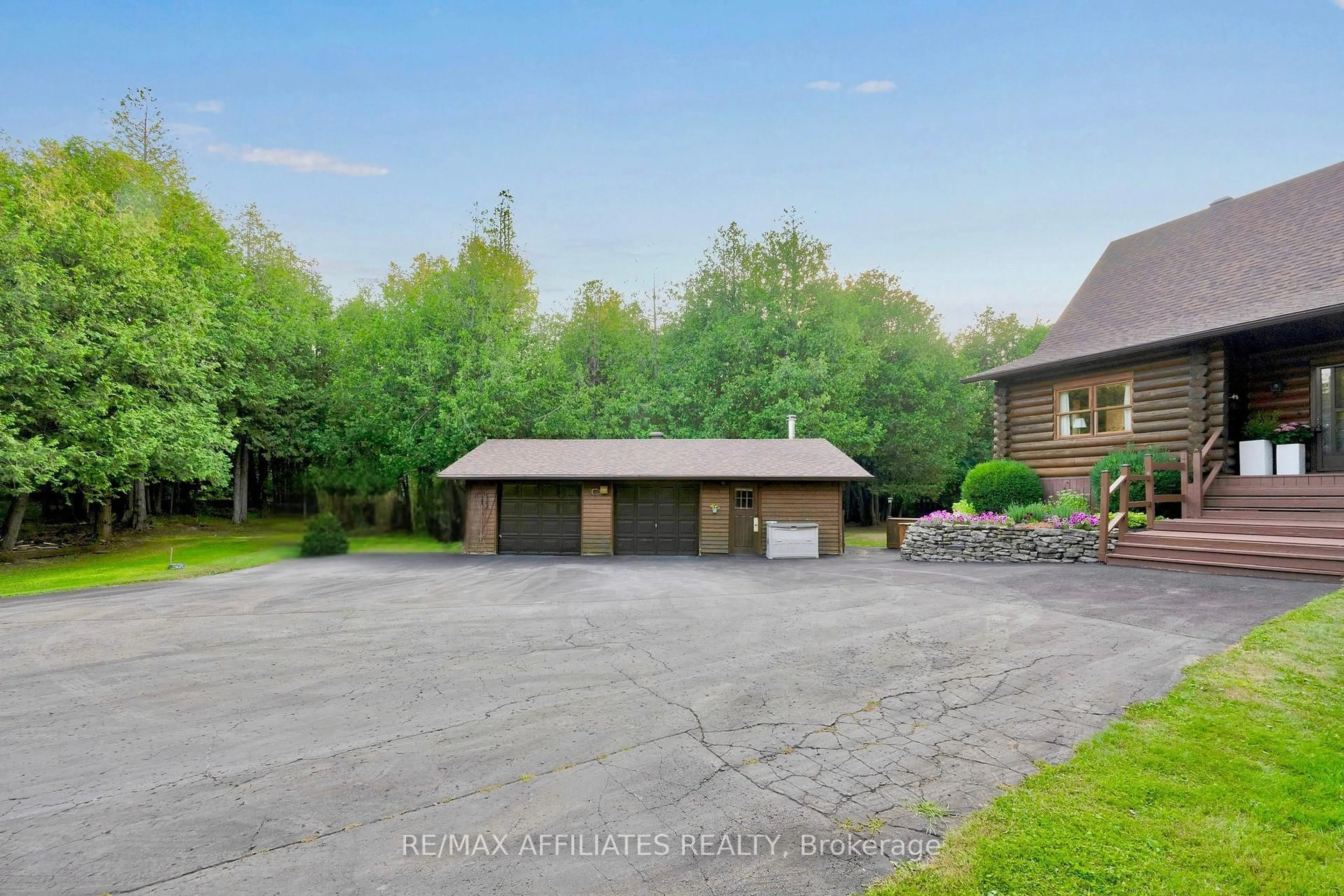 A pic from outside/outdoor area/front of a property/back of a property/a pic from drone, unknown for 256 Saunders Rd, Ashton Ontario K0A 1B0