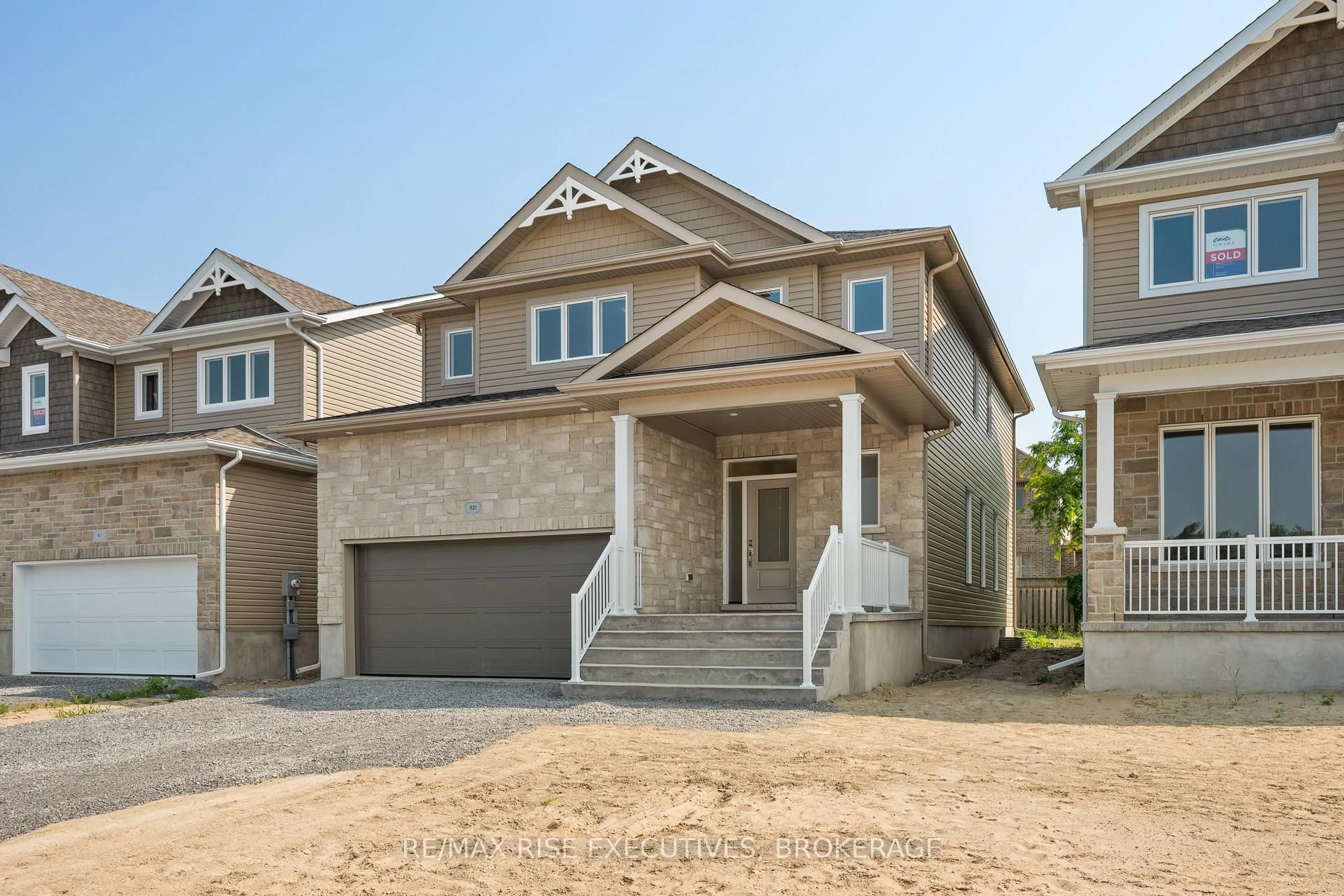 Home with brick exterior material, street for 921 Goodwin Dr, Kingston Ontario K7P 0P8