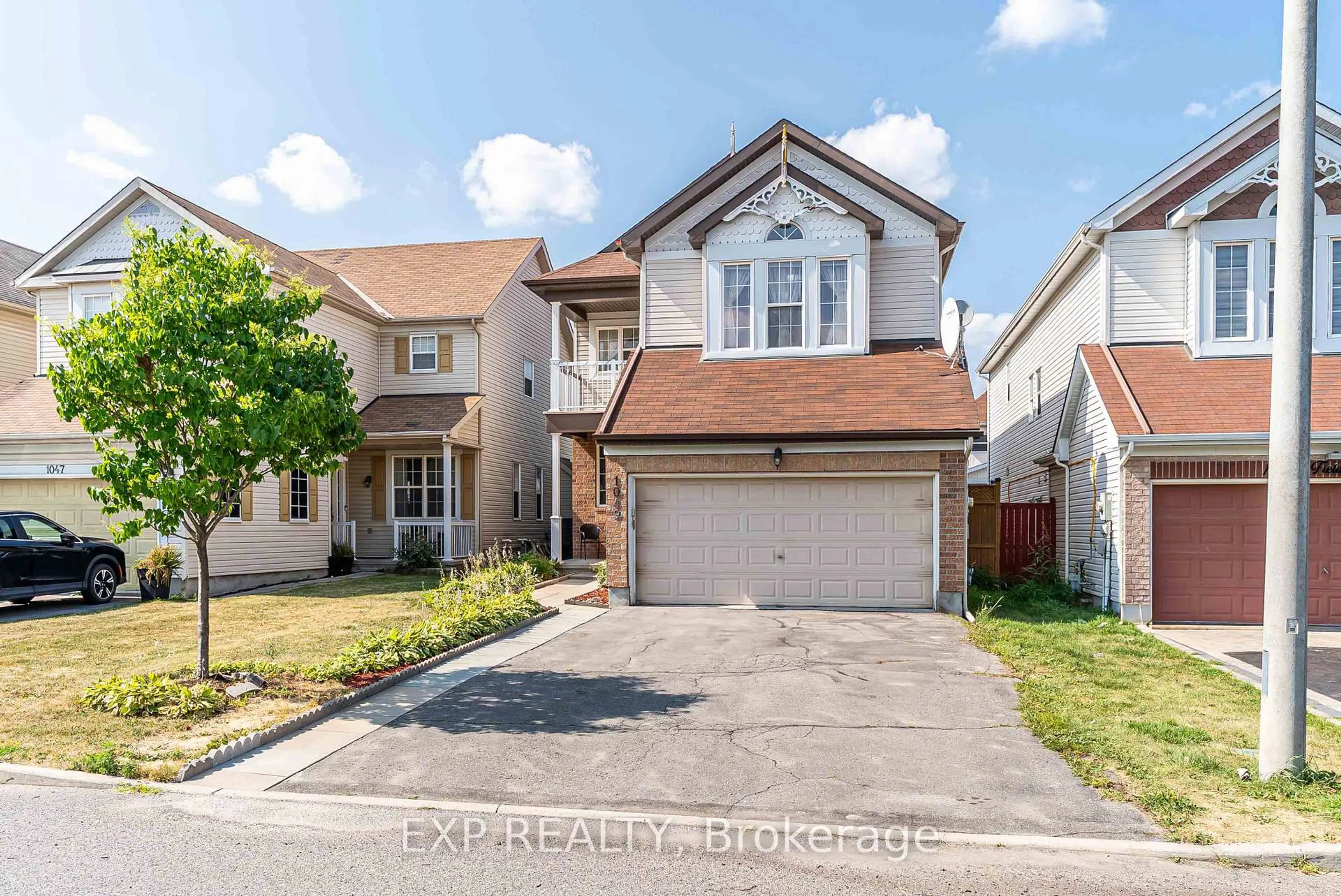 Home with vinyl exterior material, street for 1049 Fieldfair Way, Orleans Ontario K4A 0E2