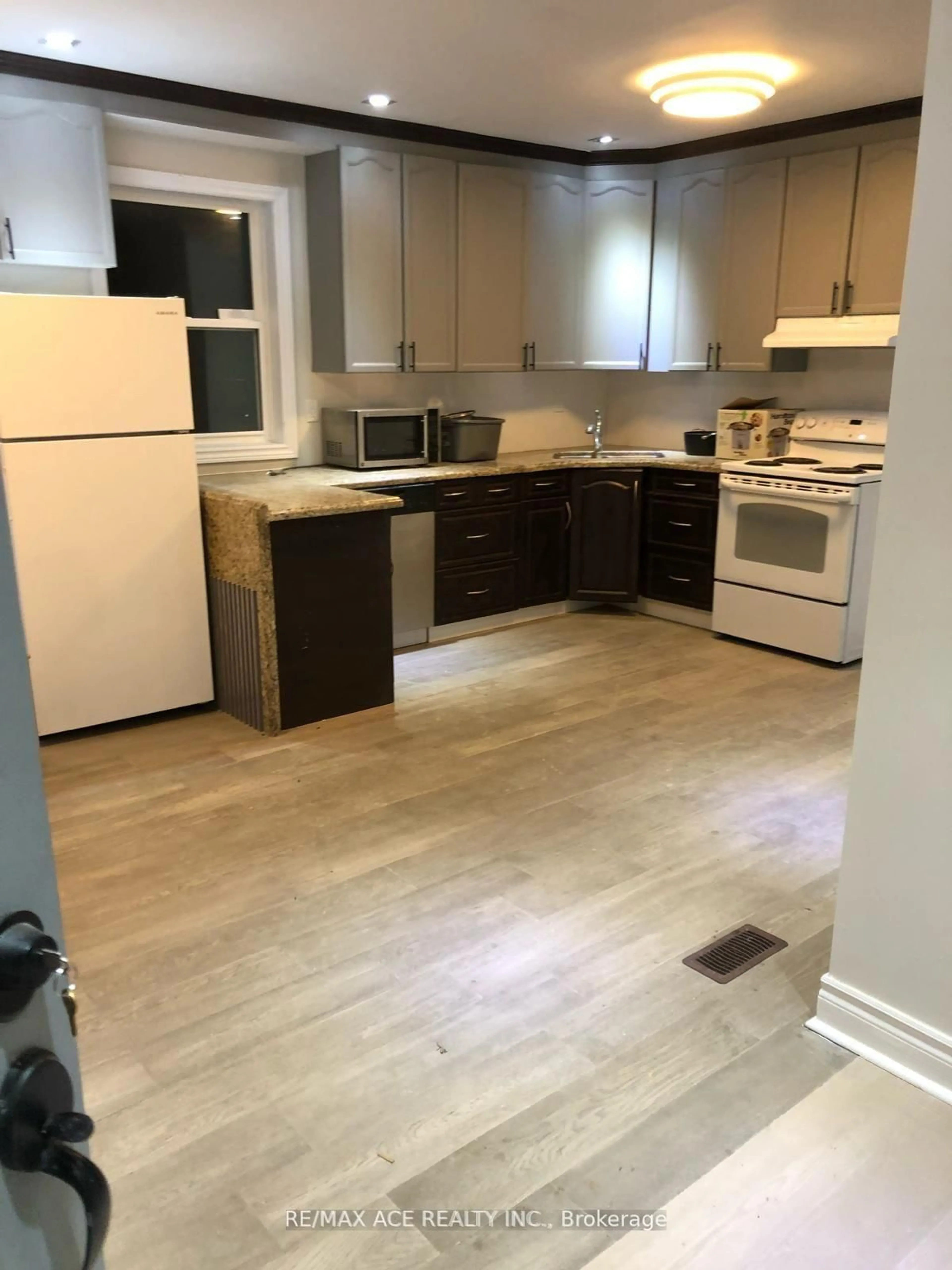 Open concept kitchen, wood/laminate floor for 970 Portage Rd, Kawartha Lakes Ontario K0M 2B0