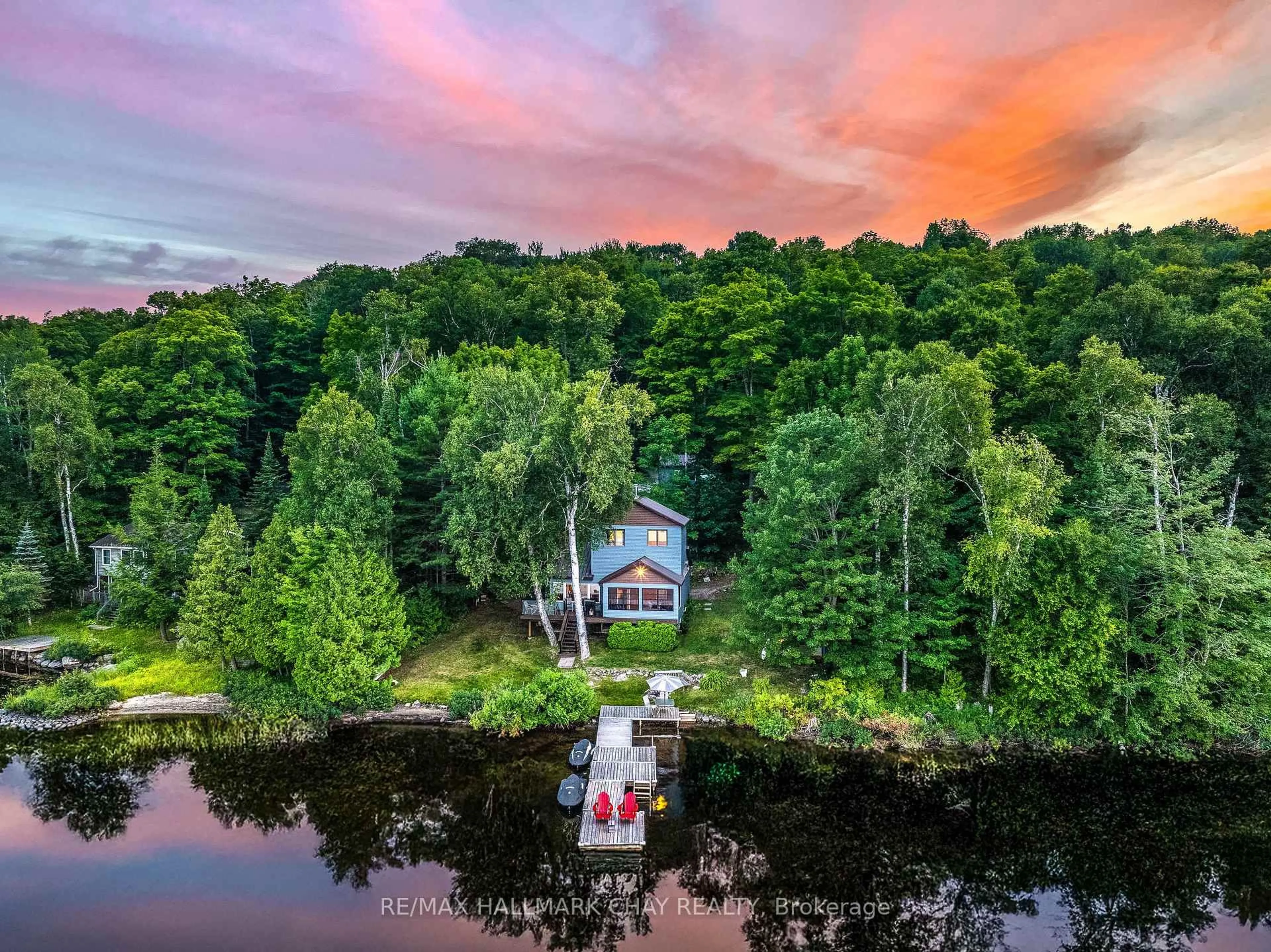 A pic from outside/outdoor area/front of a property/back of a property/a pic from drone, water/lake/river/ocean view for 1104 Hammond Rd, Lake of Bays Ontario P0B 1A0