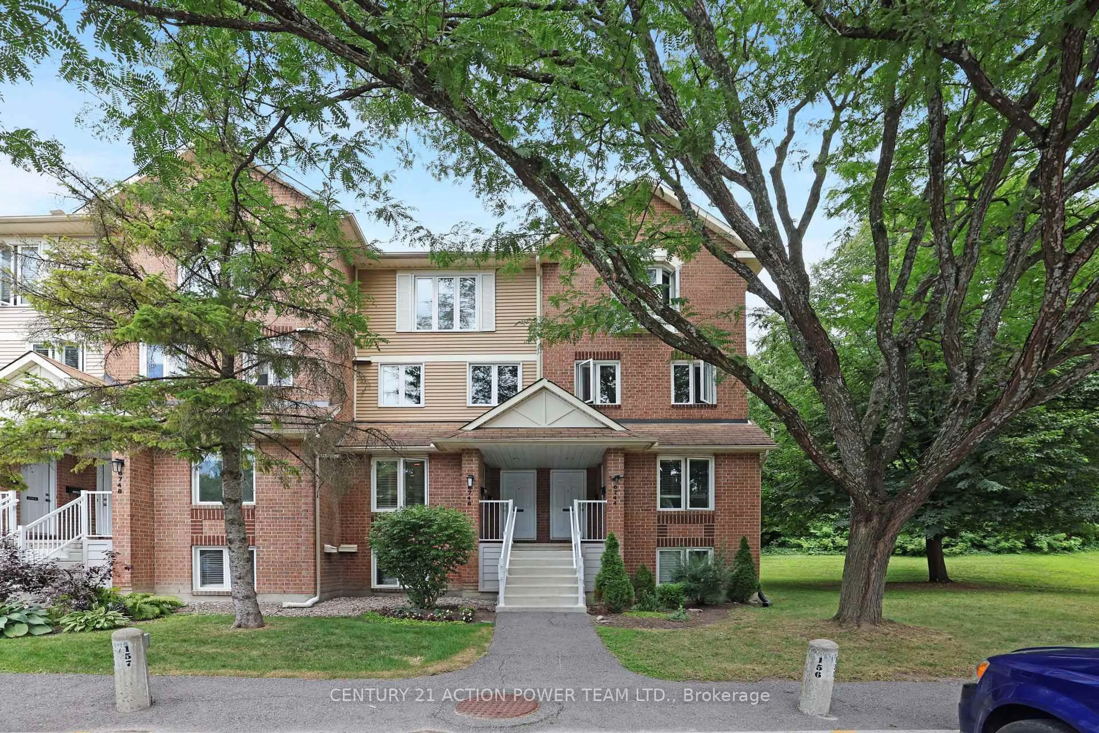 Home with brick exterior material, street for 6746 JEANNE D'ARC Blvd #A, Ottawa Ontario K1C 6E9