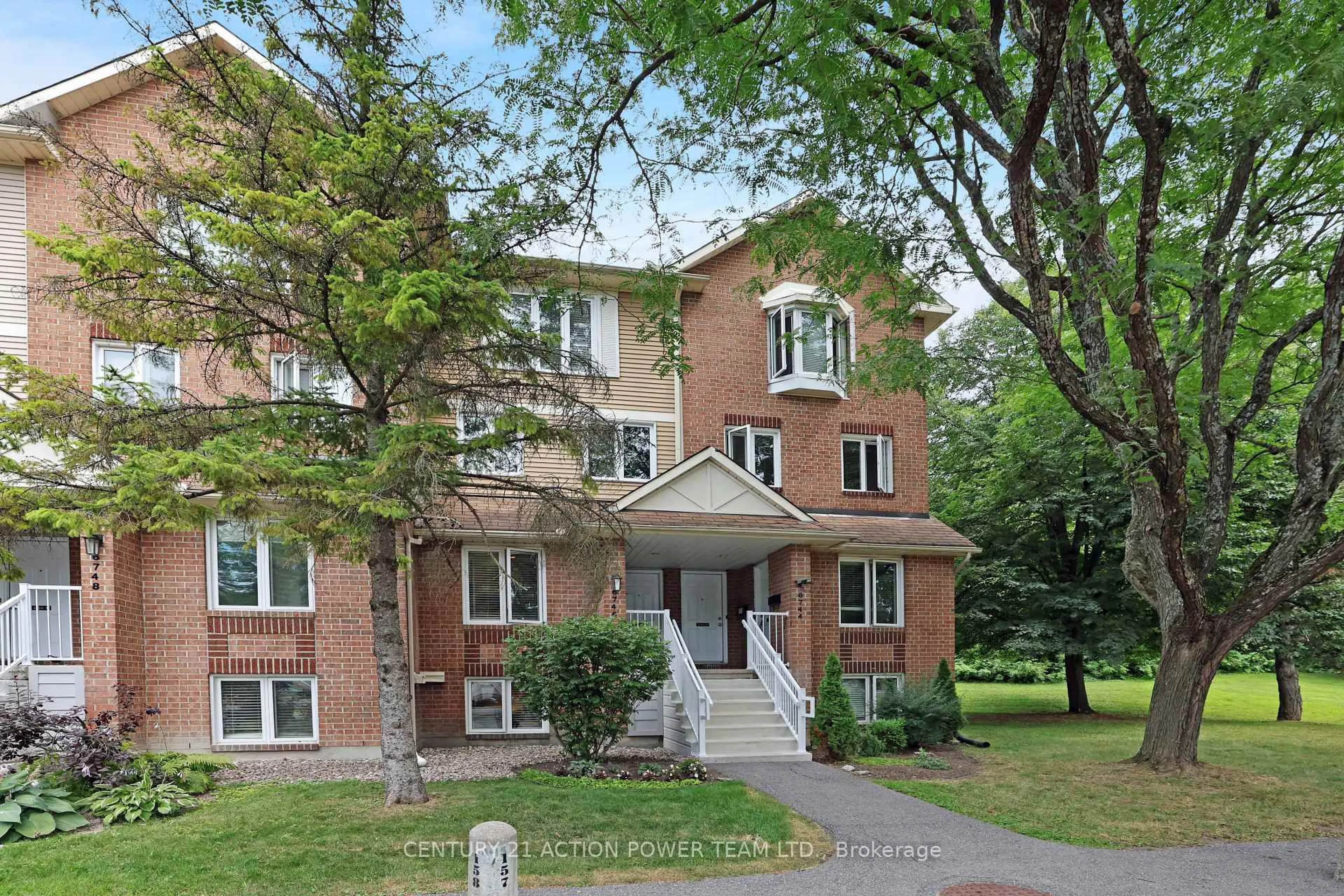Home with brick exterior material, street for 6746 JEANNE D'ARC Blvd #A, Ottawa Ontario K1C 6E9
