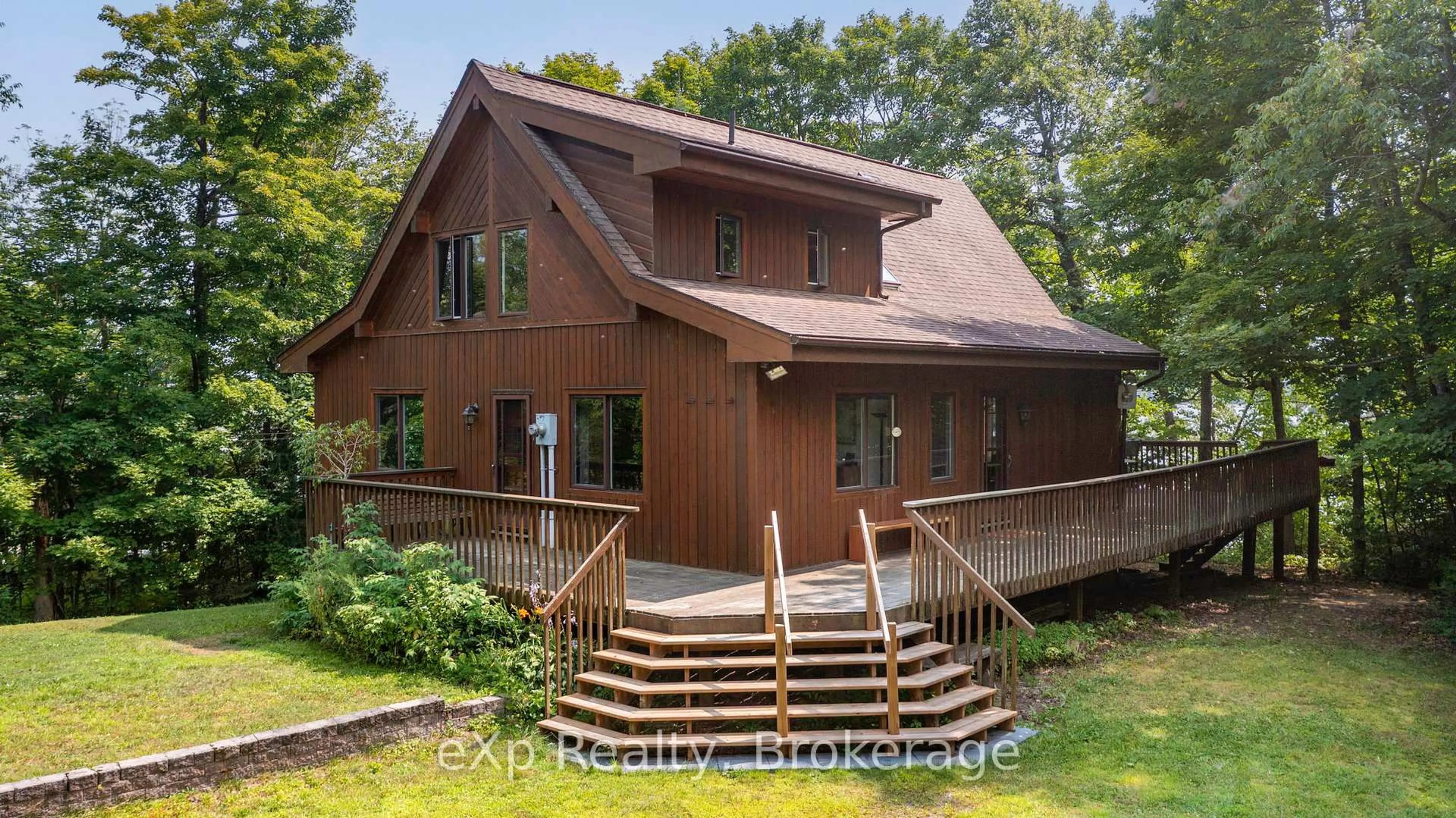Home with vinyl exterior material, unknown for 23 Lizzies Lane, McKellar Ontario P2A 0B4