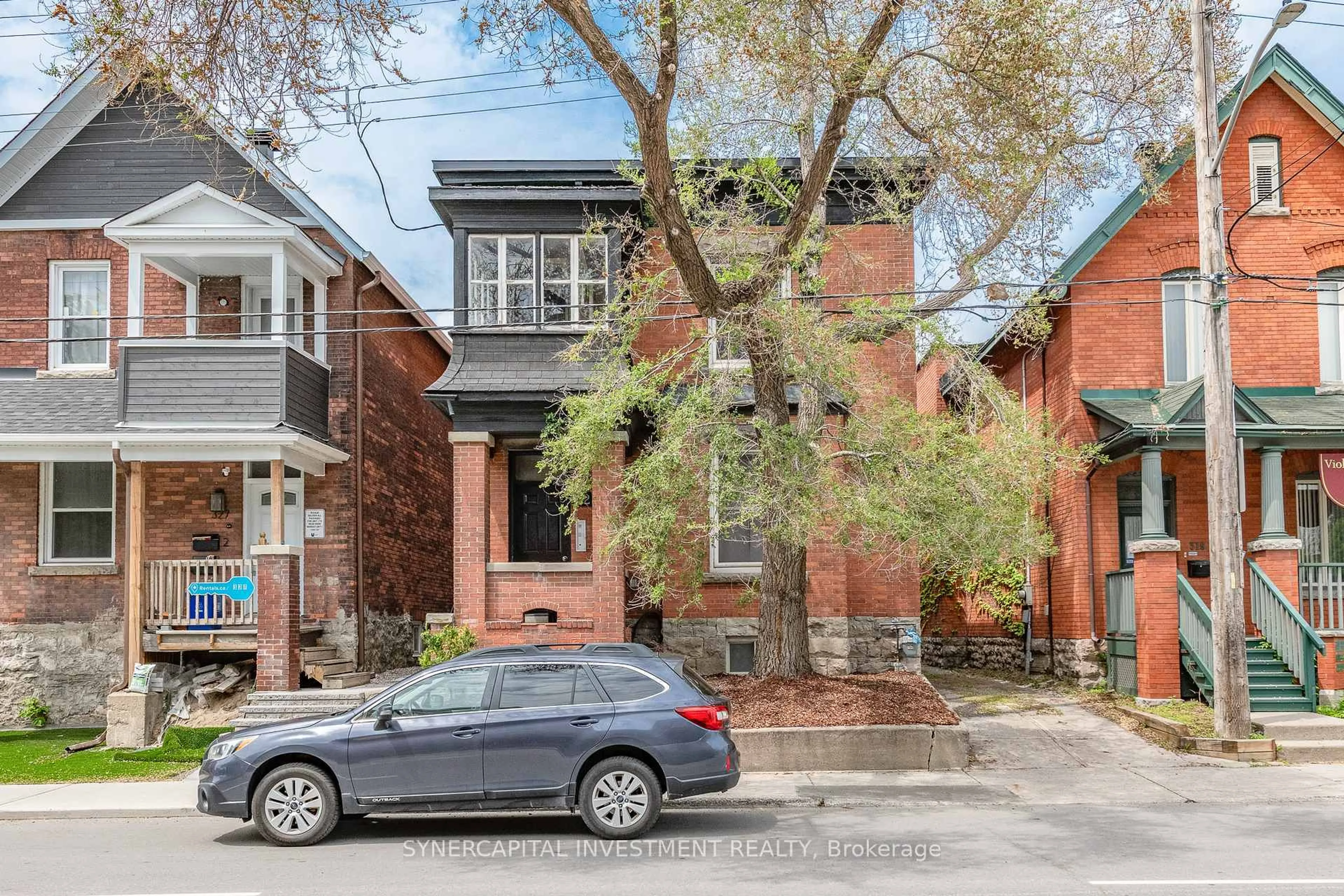 Home with brick exterior material, street for 323 Catherine St, Ottawa Ontario K1R 5T4