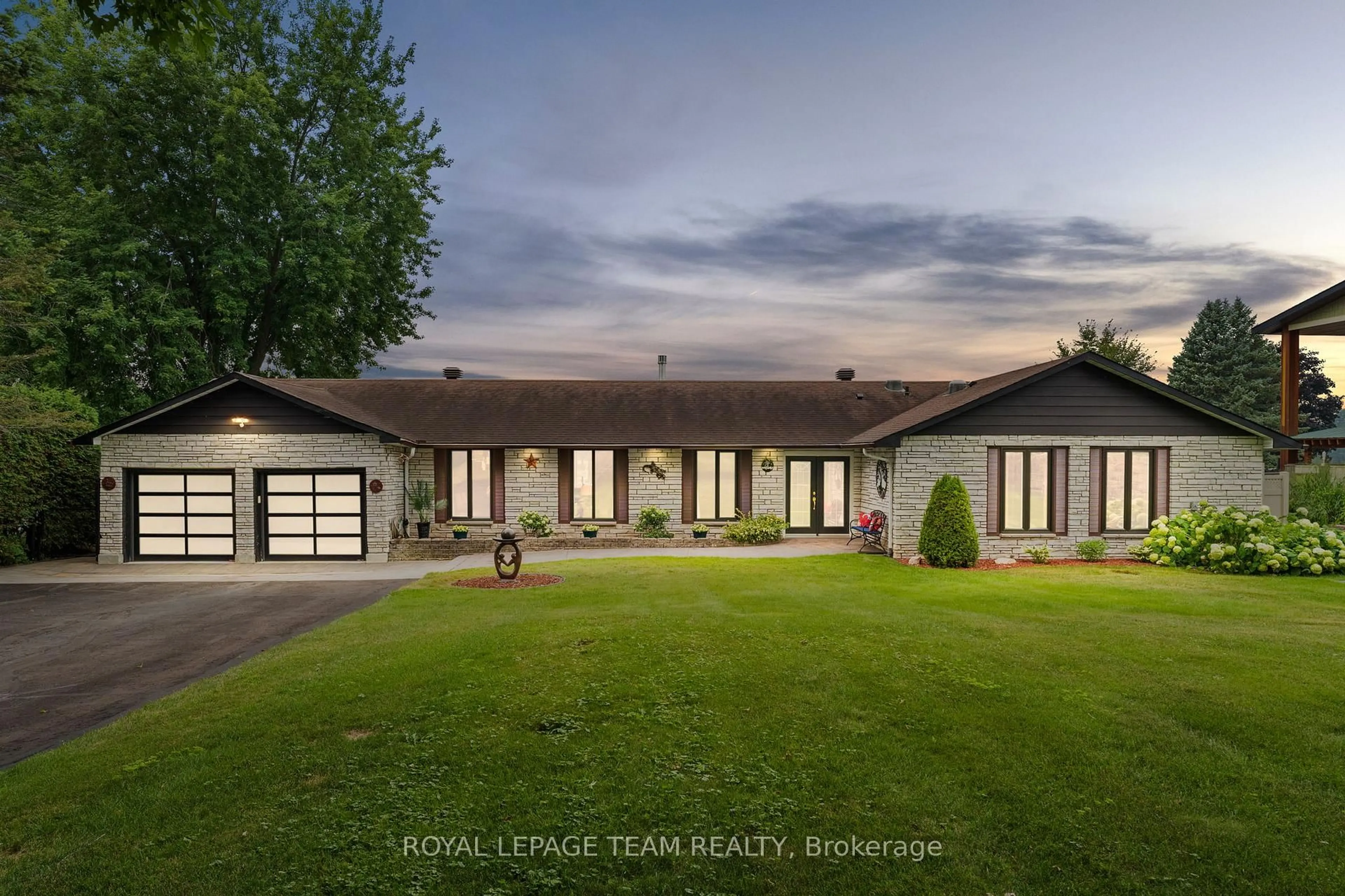 Home with vinyl exterior material, street for 1072 River Rd, Ottawa Ontario K4M 1B4