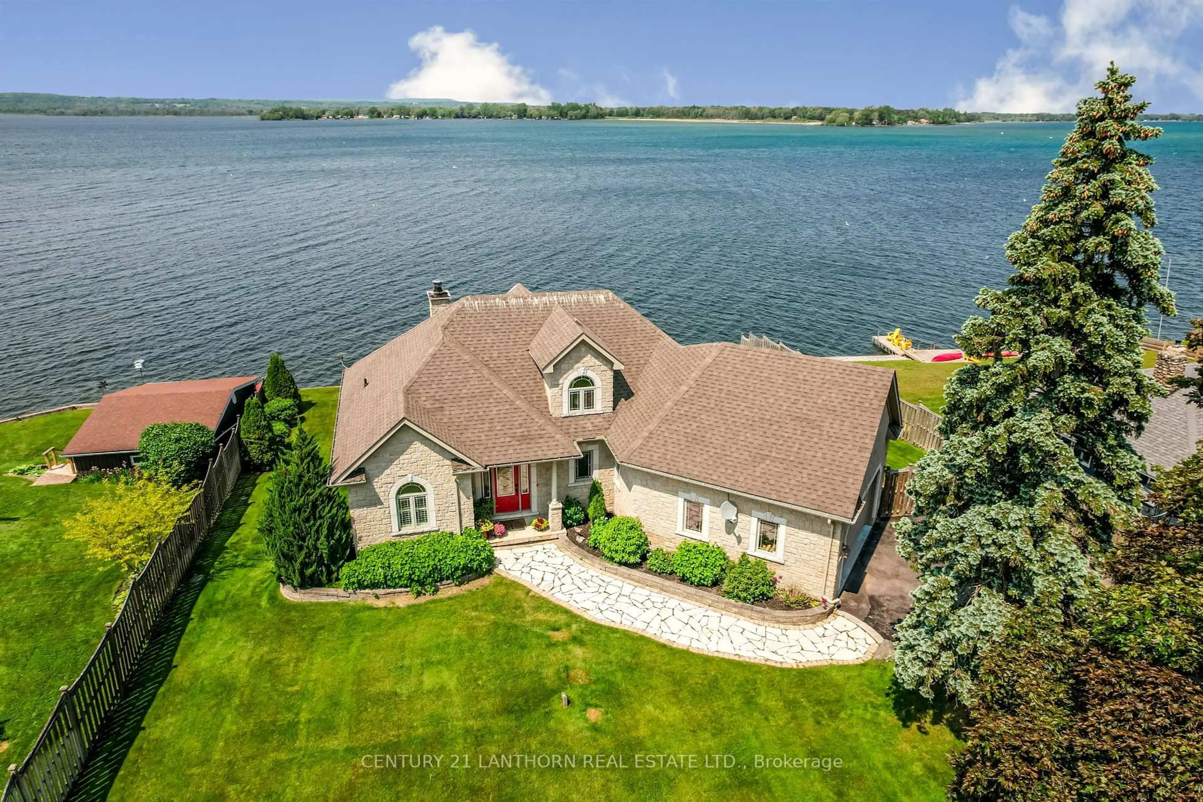 A pic from outside/outdoor area/front of a property/back of a property/a pic from drone, water/lake/river/ocean view for 54 Bayshore Rd, Brighton Ontario K0K 1H0