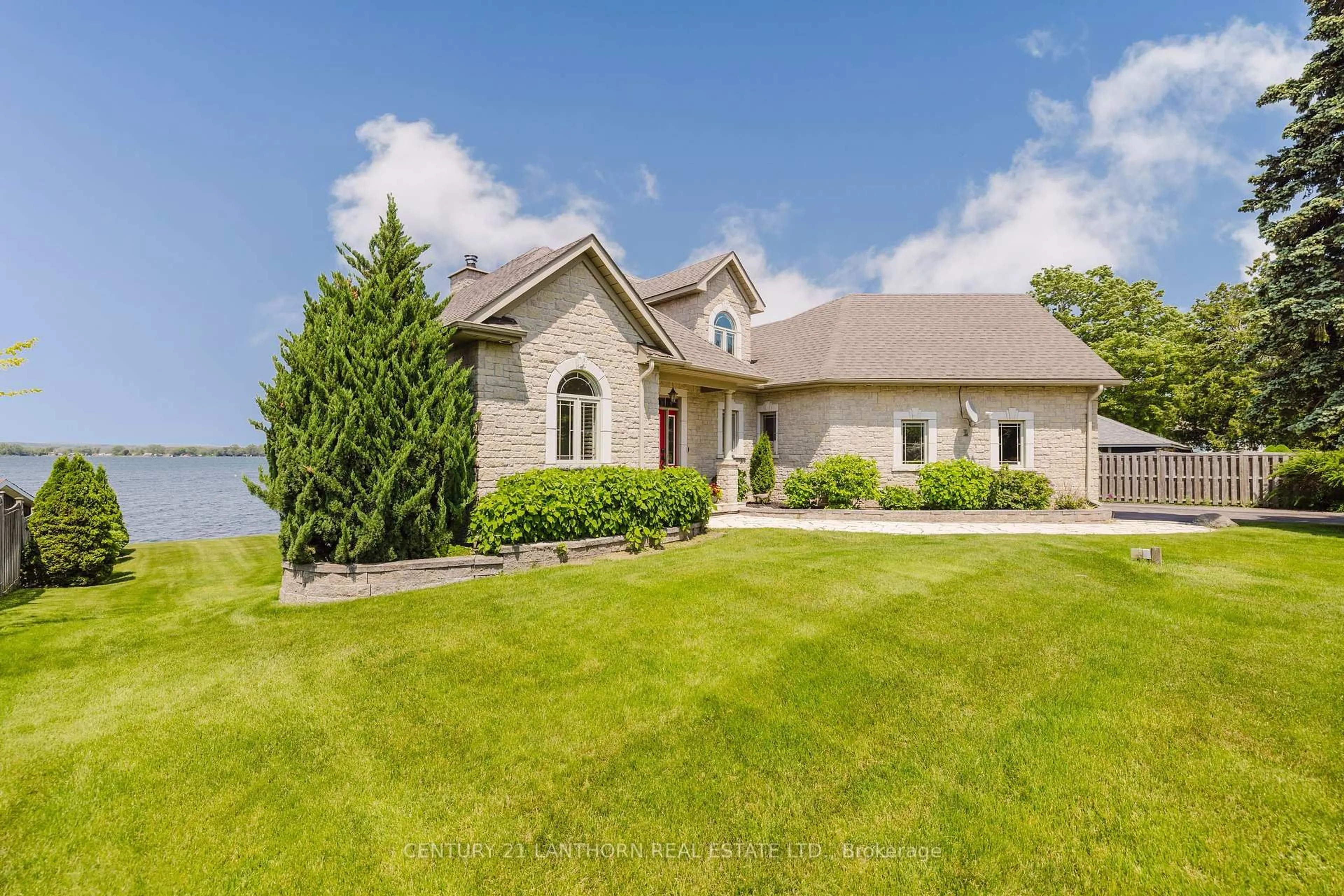 A pic from outside/outdoor area/front of a property/back of a property/a pic from drone, water/lake/river/ocean view for 54 Bayshore Rd, Brighton Ontario K0K 1H0