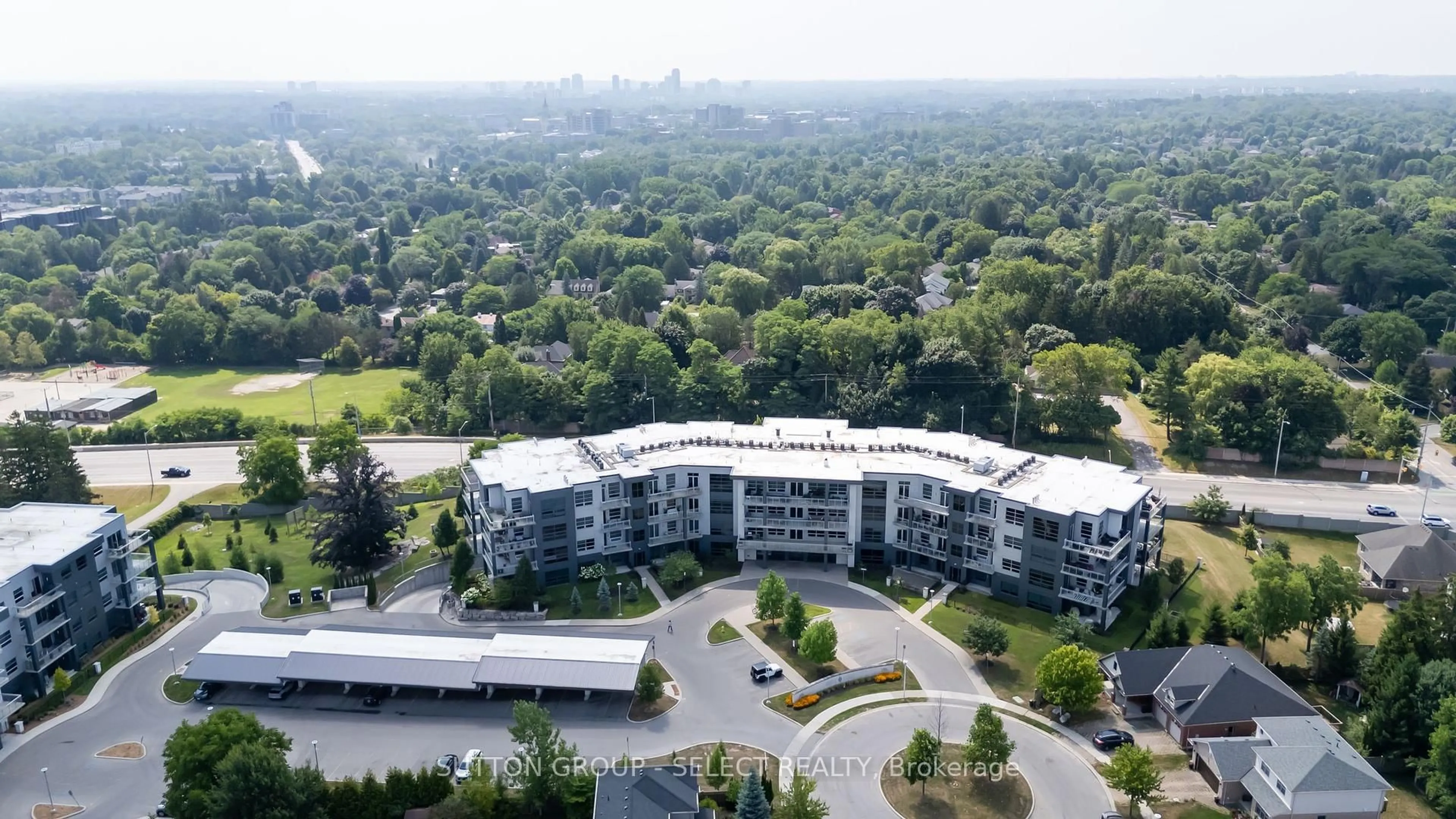 A pic from outside/outdoor area/front of a property/back of a property/a pic from drone, city buildings view from balcony for 1705 Fiddlehead Pl #206, London North Ontario N6G 5M6