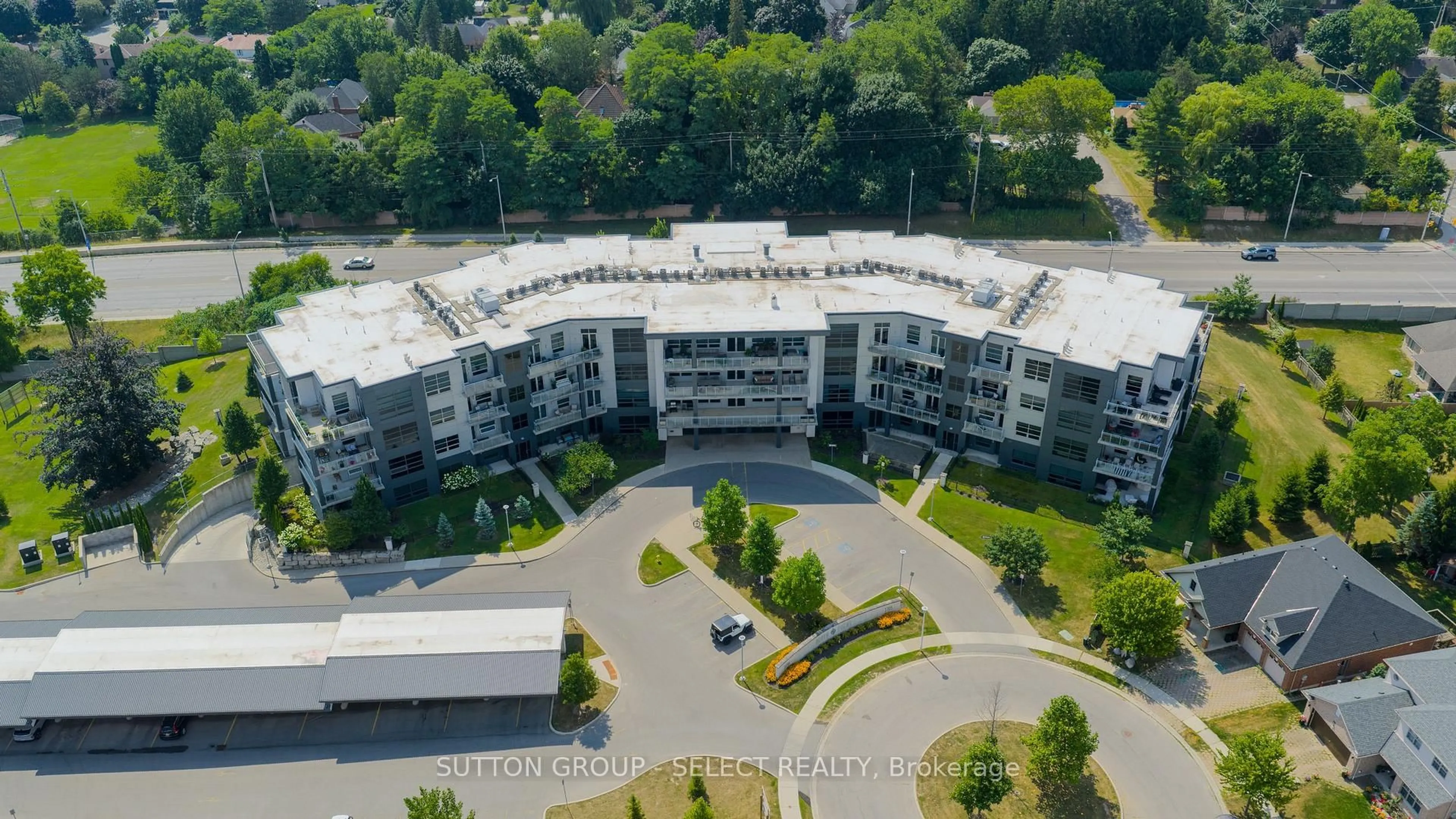 A pic from outside/outdoor area/front of a property/back of a property/a pic from drone, building for 1705 Fiddlehead Pl #206, London North Ontario N6G 5M6