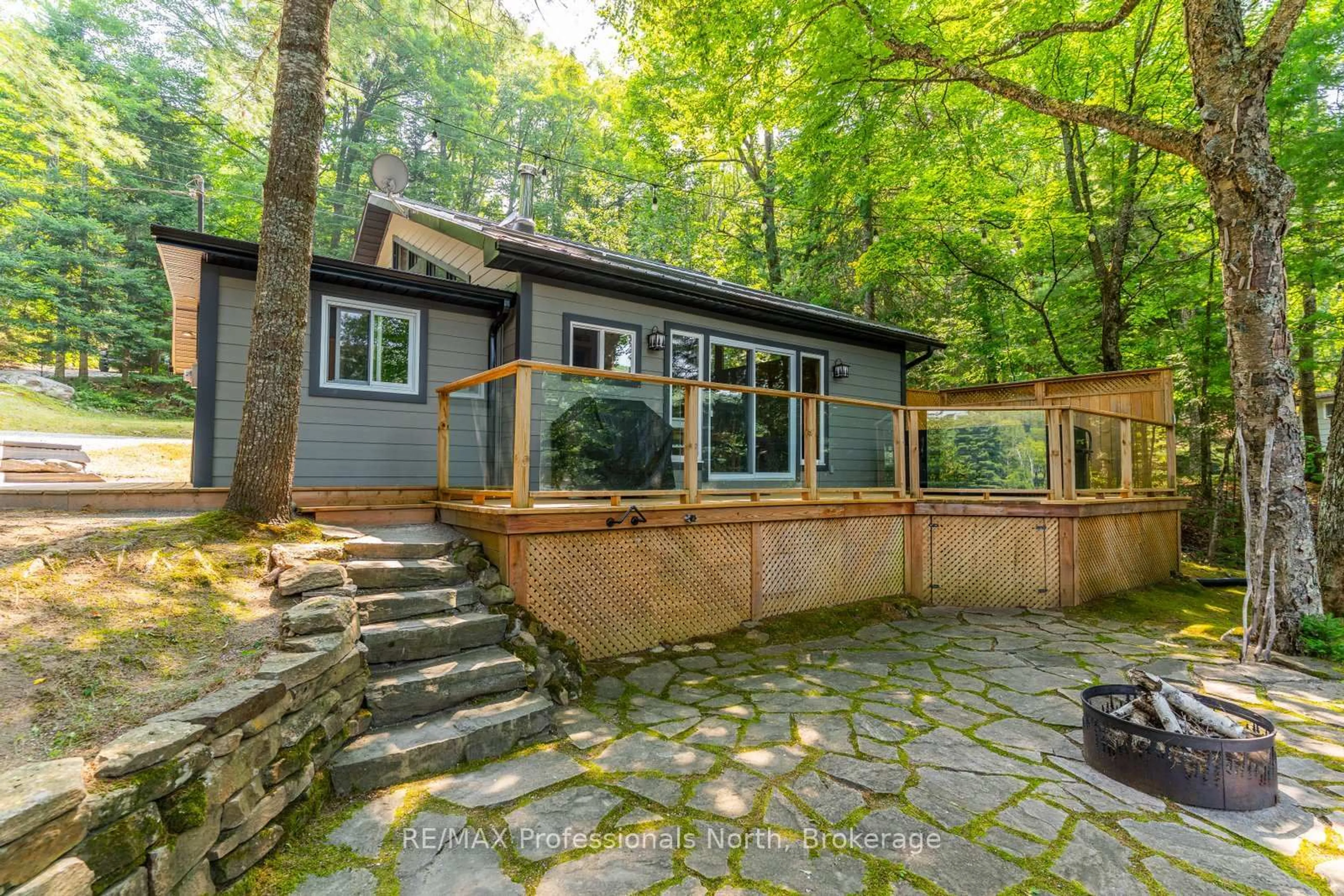 Patio, forest/trees view for 1023 Colonization Tr, Dysart et al Ontario K0M 1S0