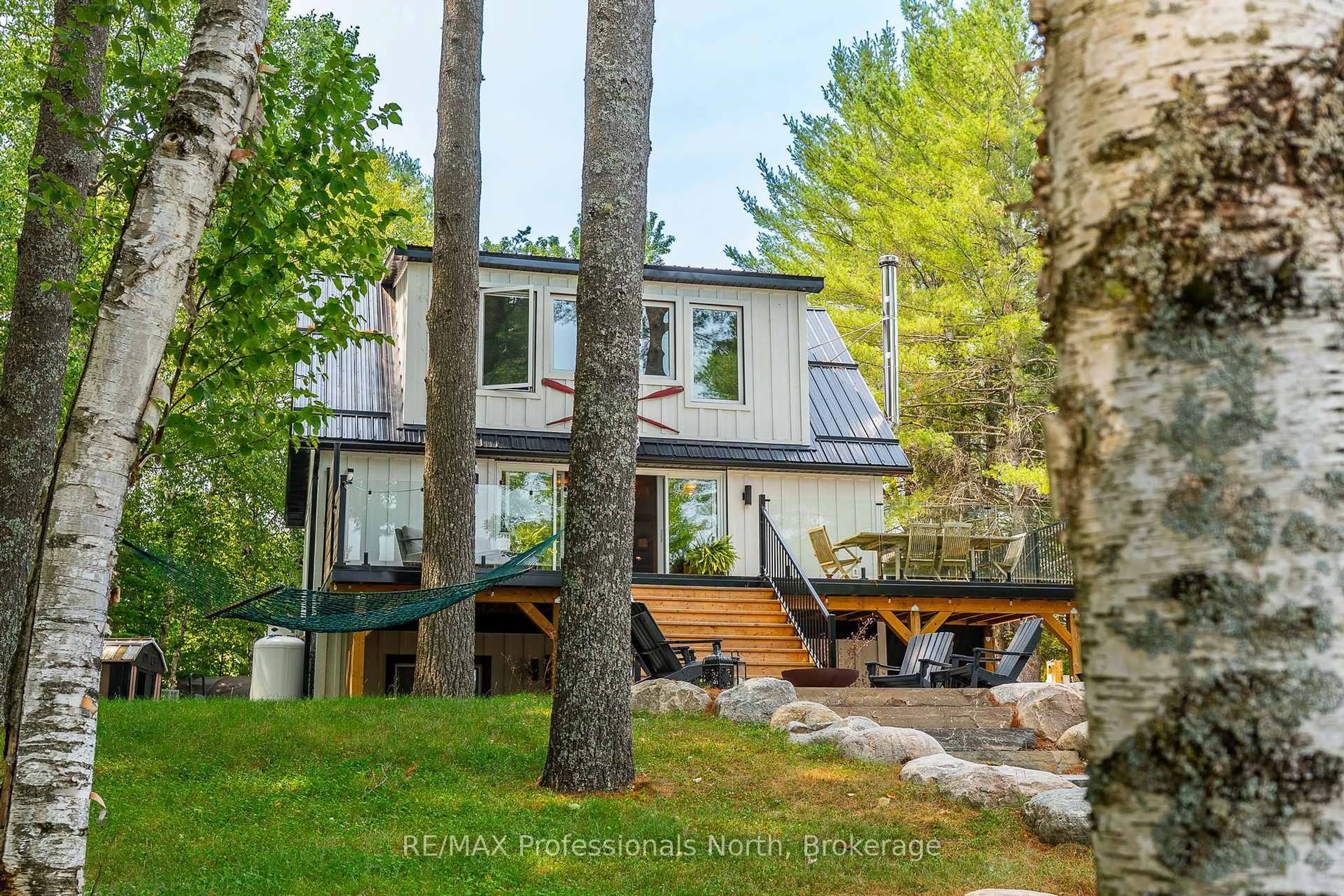Home with vinyl exterior material, forest/trees view for 1795 Wigamog Rd, Dysart et al Ontario K0M 1S0
