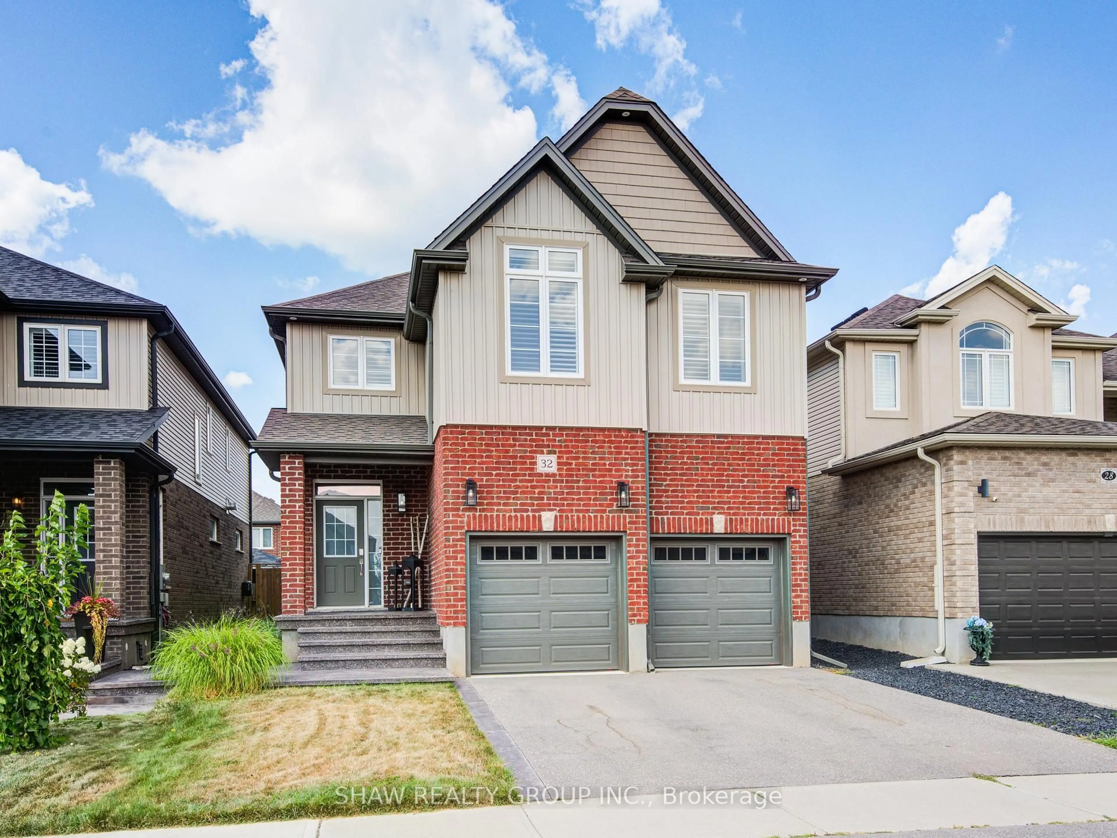 Home with brick exterior material, street for 32 Arlington Pkwy, Brant Ontario N3L 0G2