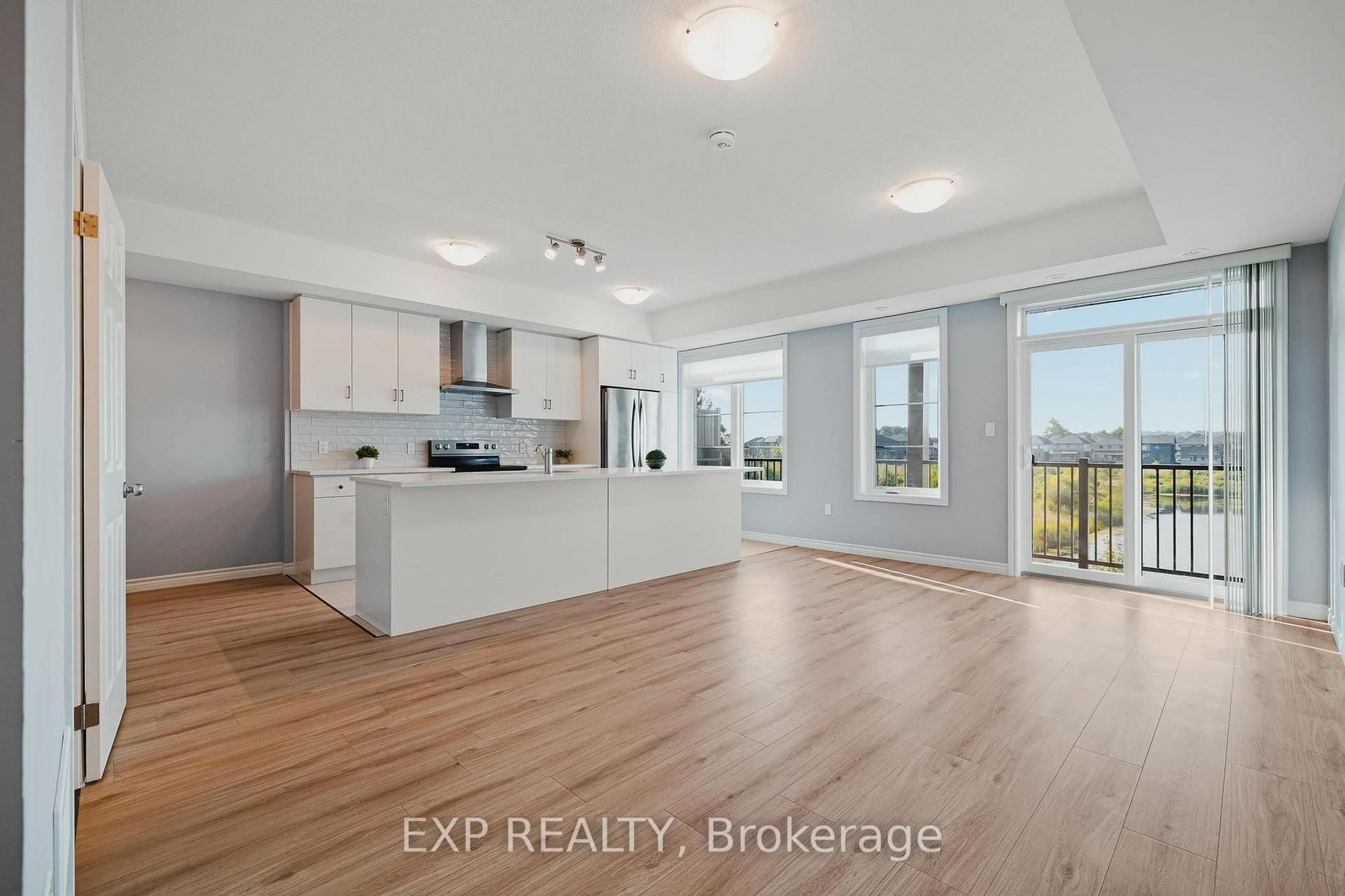 Open concept kitchen, wood/laminate floor for 104 Lomond Lane, Kitchener Ontario N2R 0T6