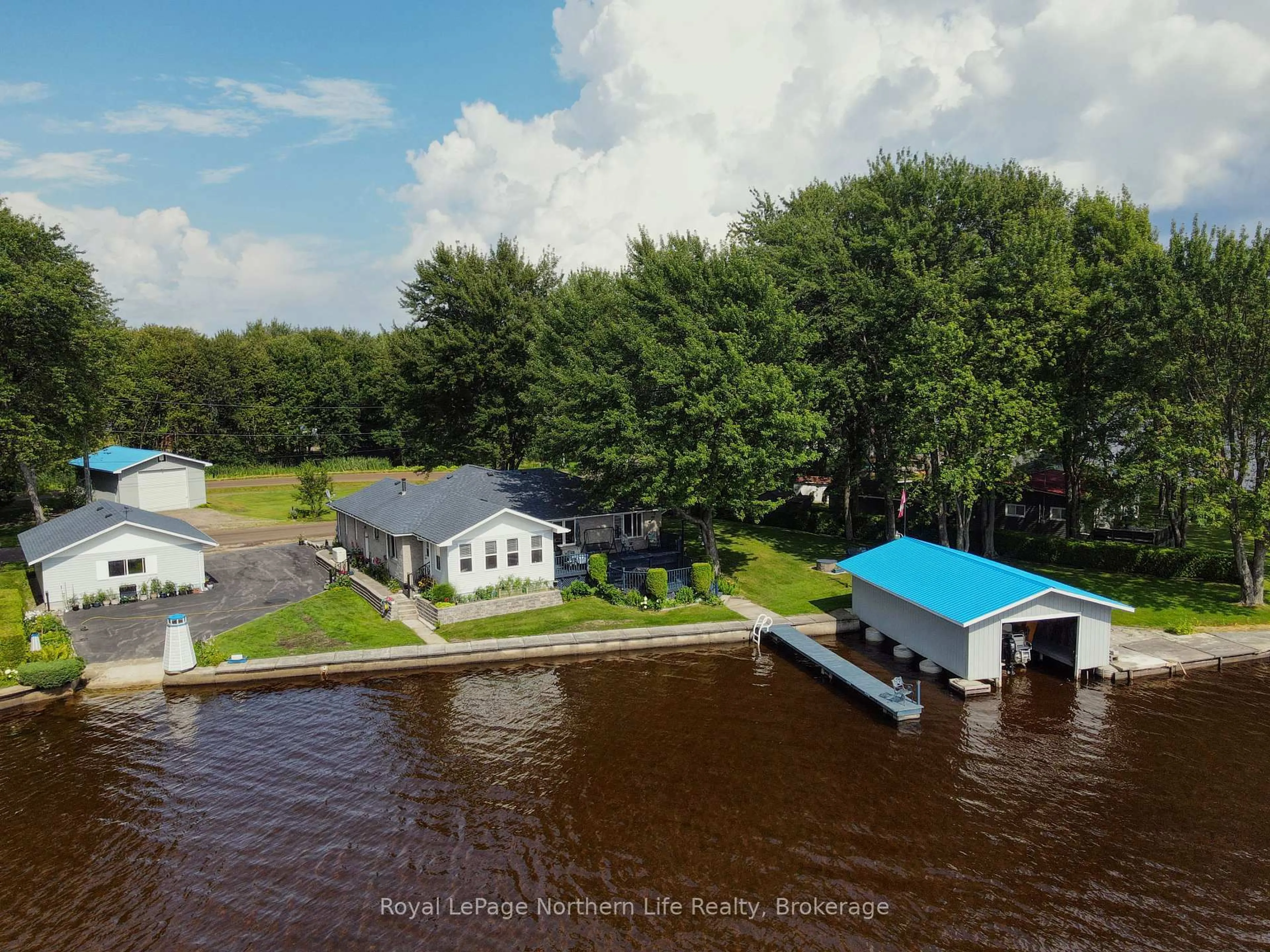 A pic from outside/outdoor area/front of a property/back of a property/a pic from drone, water/lake/river/ocean view for 640 Lac Des Deux Milles Rd, West Nipissing Ontario P2B 2X4
