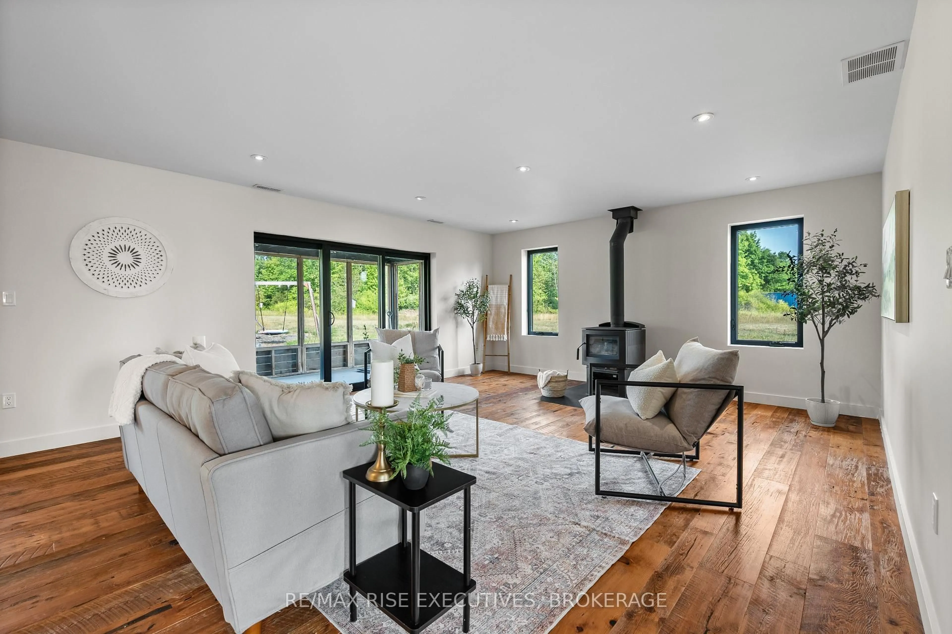 Living room with furniture, unknown for 2621 County Road 6 Rd, Yarker Ontario K0K 3N0