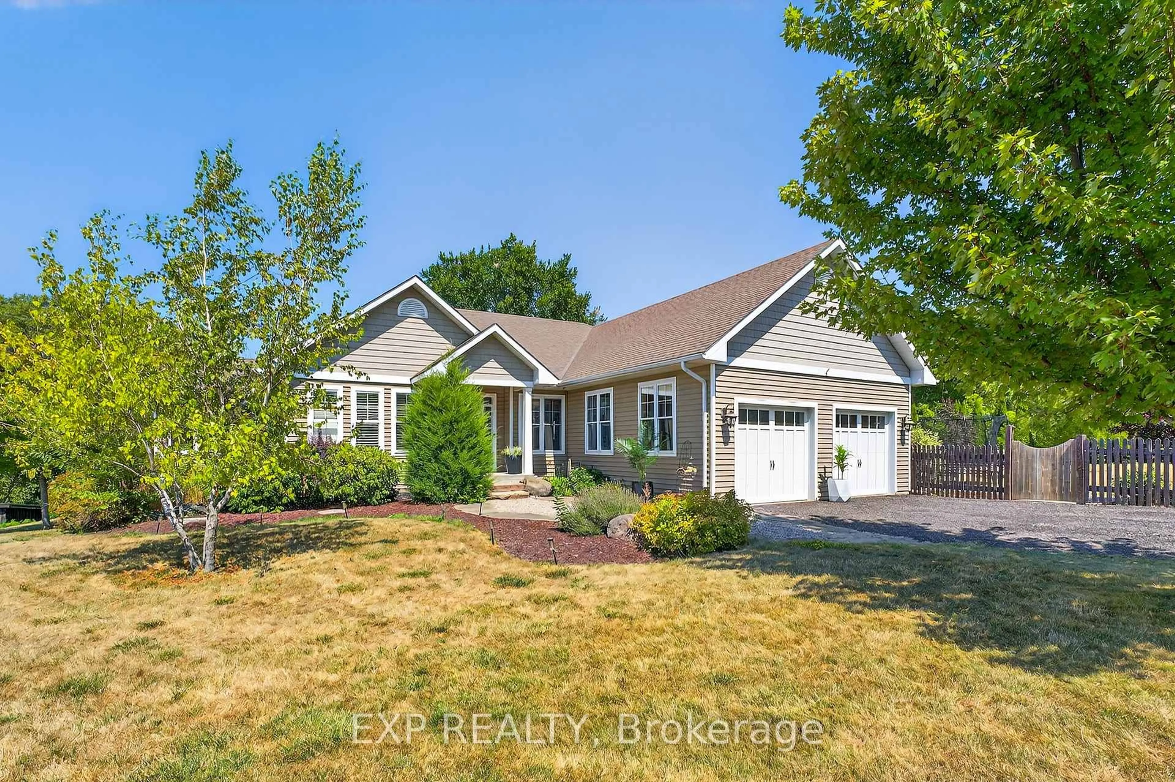 Home with vinyl exterior material, street for 12 Olde Stone Rd, Prince Edward County Ontario K0K 1L0