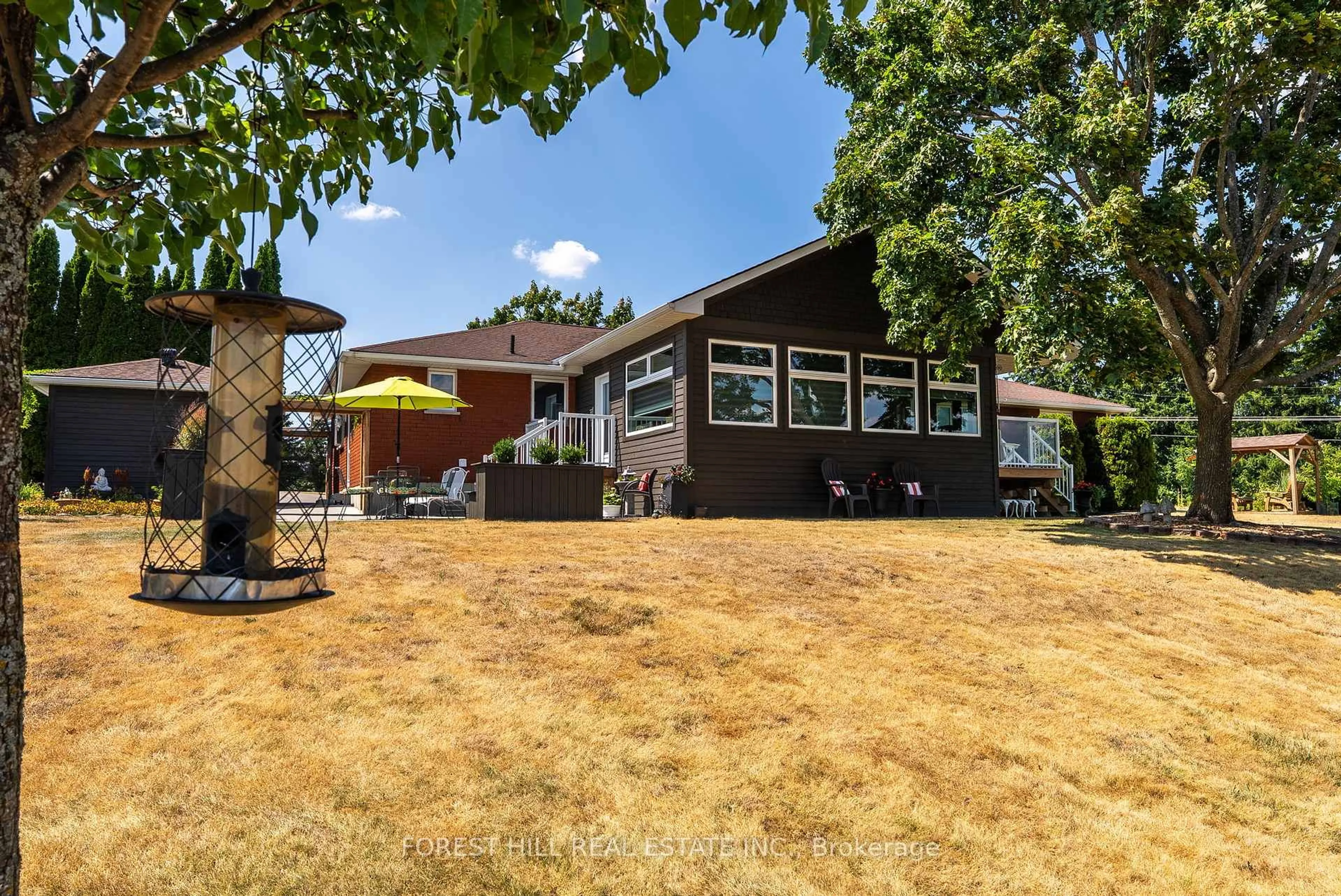 A pic from outside/outdoor area/front of a property/back of a property/a pic from drone, mountain view for 53 Nurse Ave, Selwyn Ontario K0L 1T0