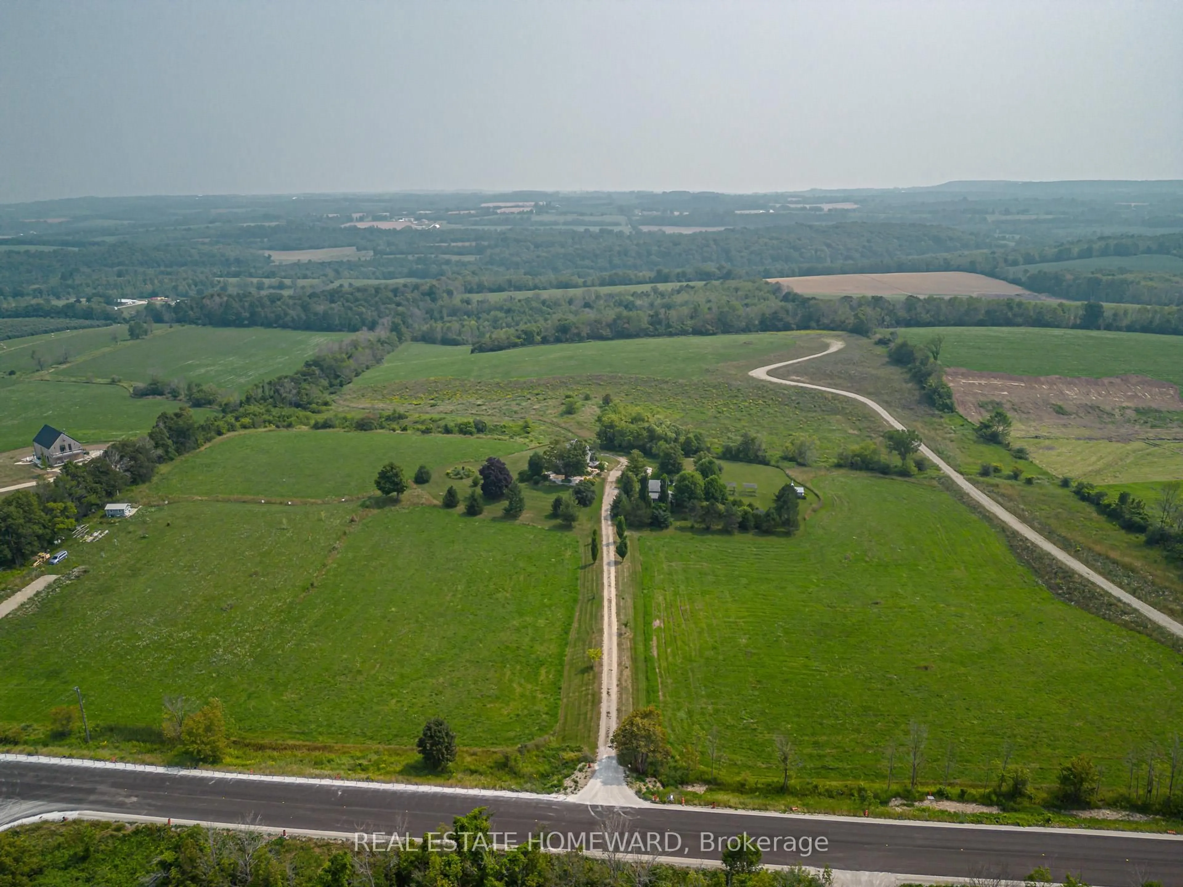 A pic from outside/outdoor area/front of a property/back of a property/a pic from drone, unknown for 137295 12 GREY Rd, Meaford Ontario N4L 1W6