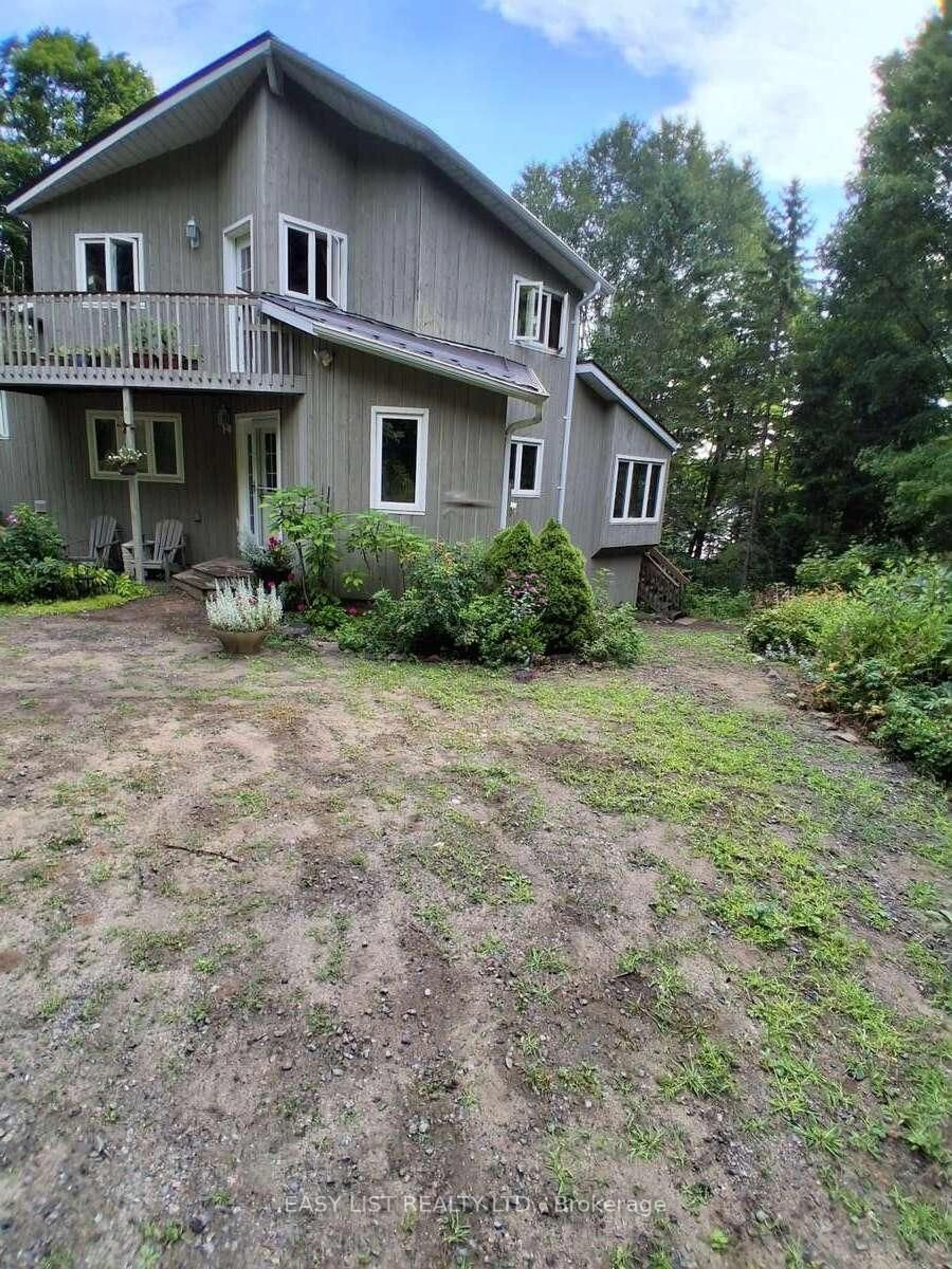 A pic from outside/outdoor area/front of a property/back of a property/a pic from drone, unknown for 175 Old Man's Lake Lane, Magnetawan Ontario P0A 1P0
