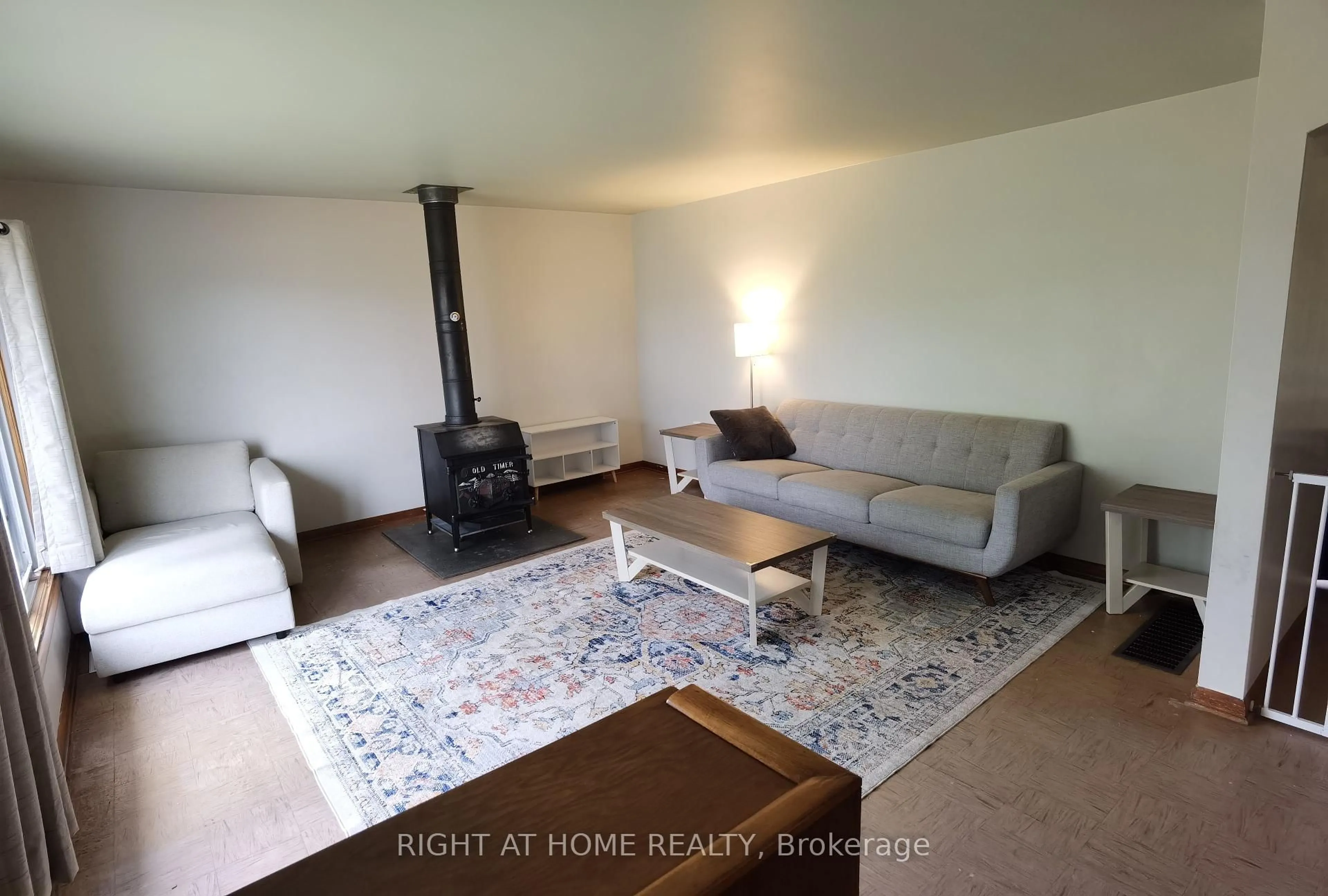 Living room with furniture, wood/laminate floor for 3630 Hillbrook Rd, Augusta Ontario K0E 1T0