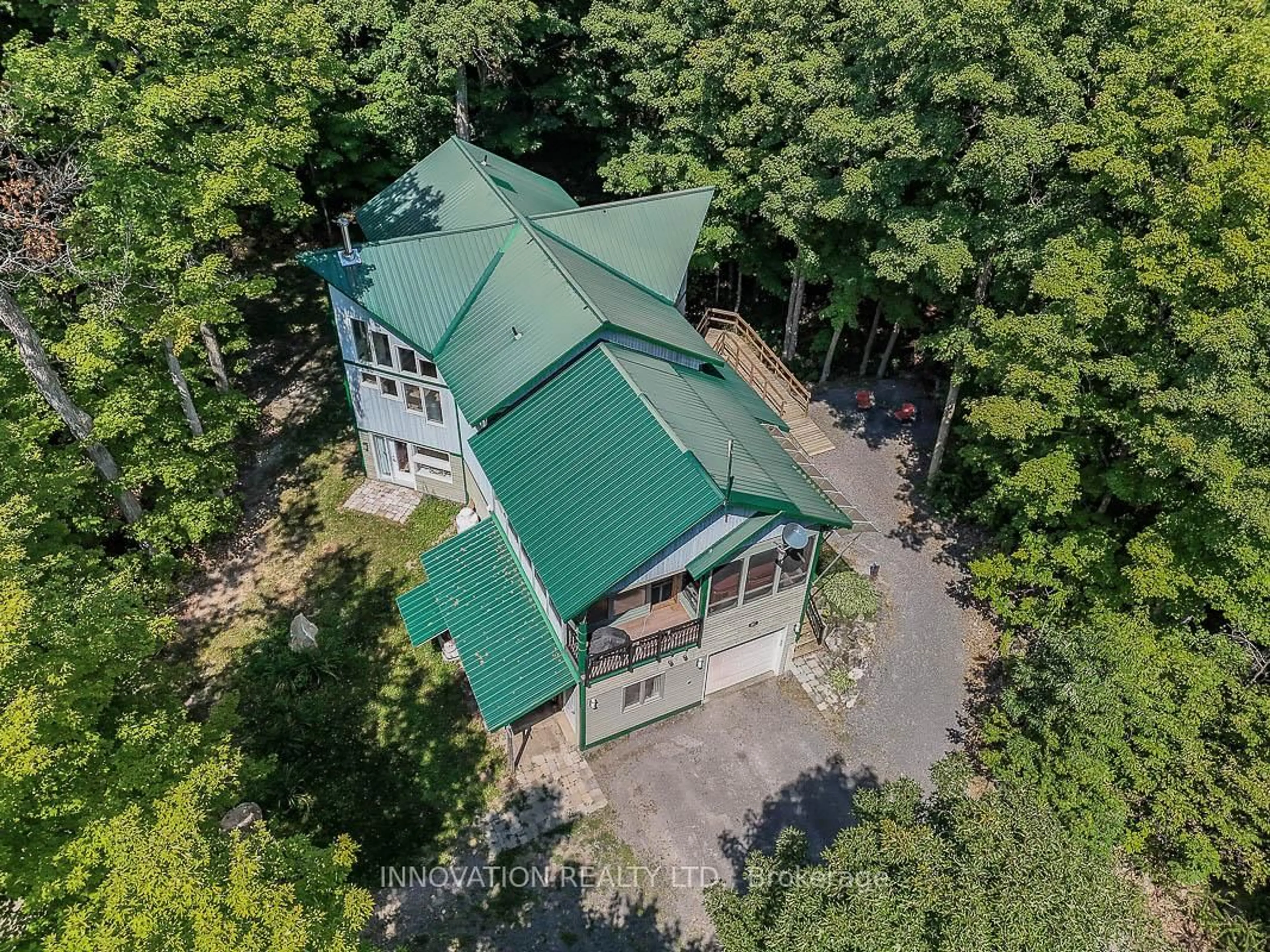 A pic from outside/outdoor area/front of a property/back of a property/a pic from drone, forest/trees view for 5149 Carp Rd, Kinburn Ontario K0A 2H0