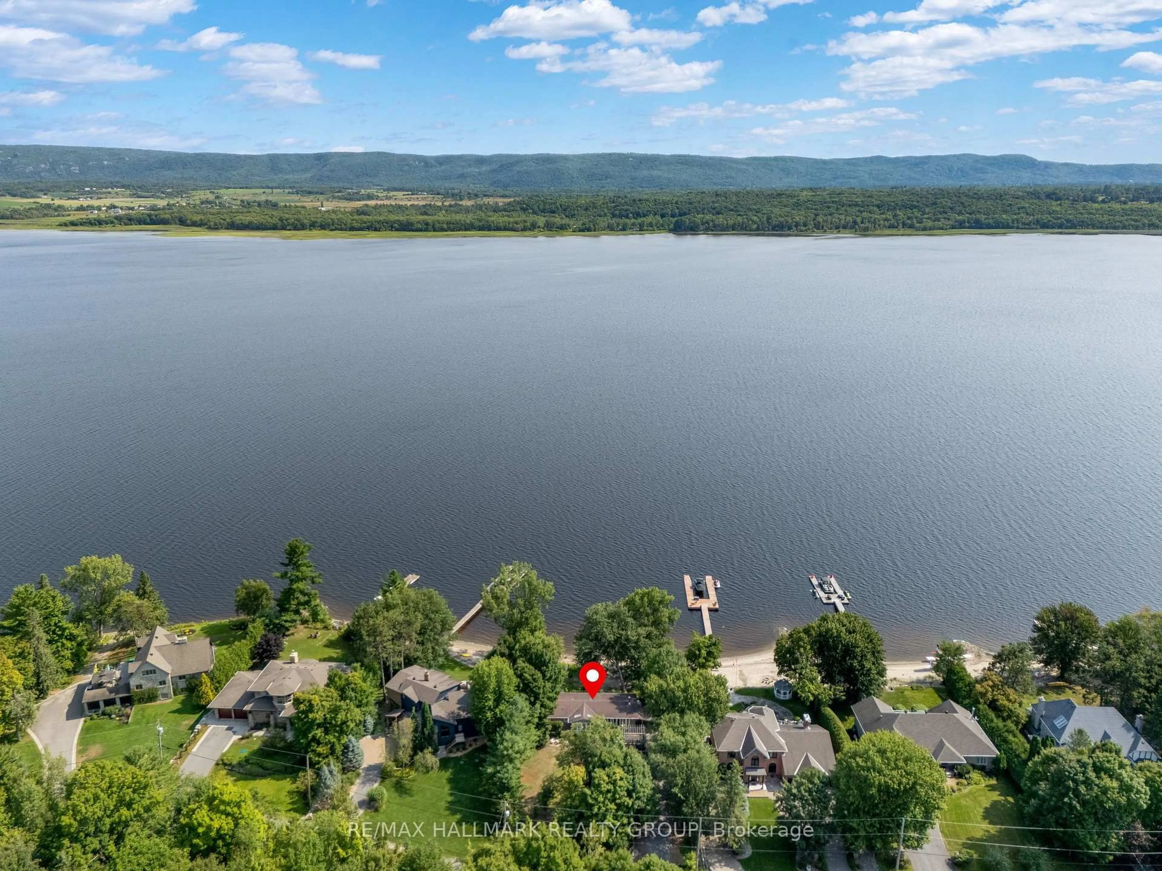 A pic from outside/outdoor area/front of a property/back of a property/a pic from drone, water/lake/river/ocean view for 2860 Barlow Cres, Ottawa Ontario K0A 1T0