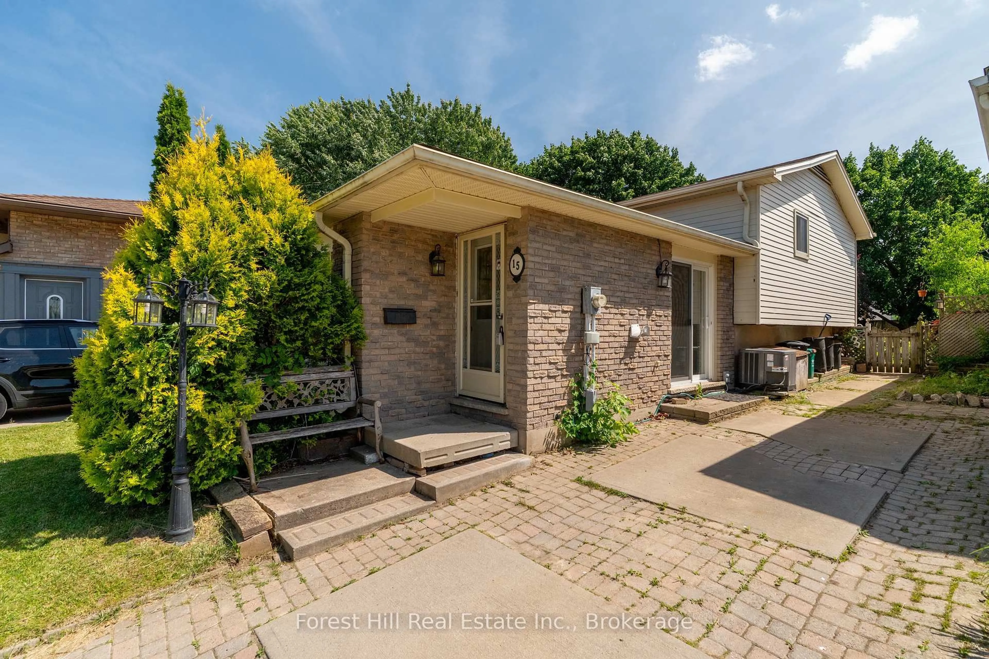 Home with brick exterior material, street for 15 Homestead Pl, Kitchener Ontario N2N 1Z1