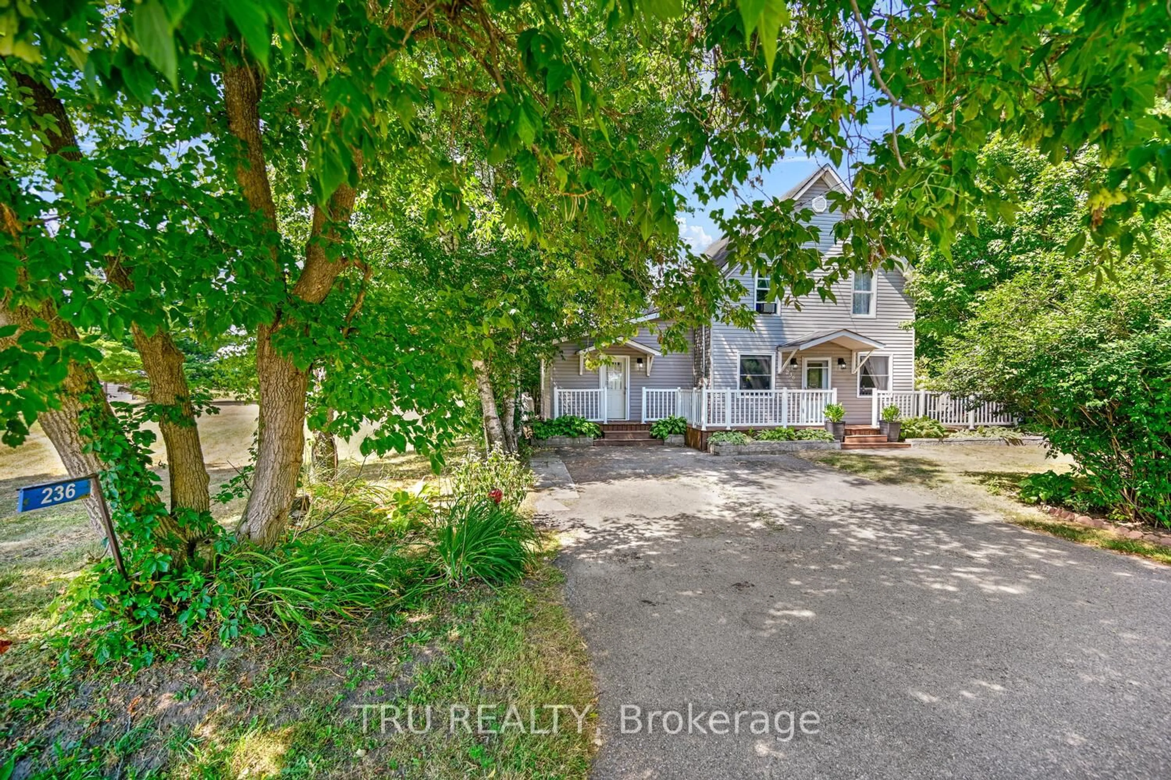 A pic from outside/outdoor area/front of a property/back of a property/a pic from drone, street for 236 Main St, Rideau Lakes Ontario K0G 1E0
