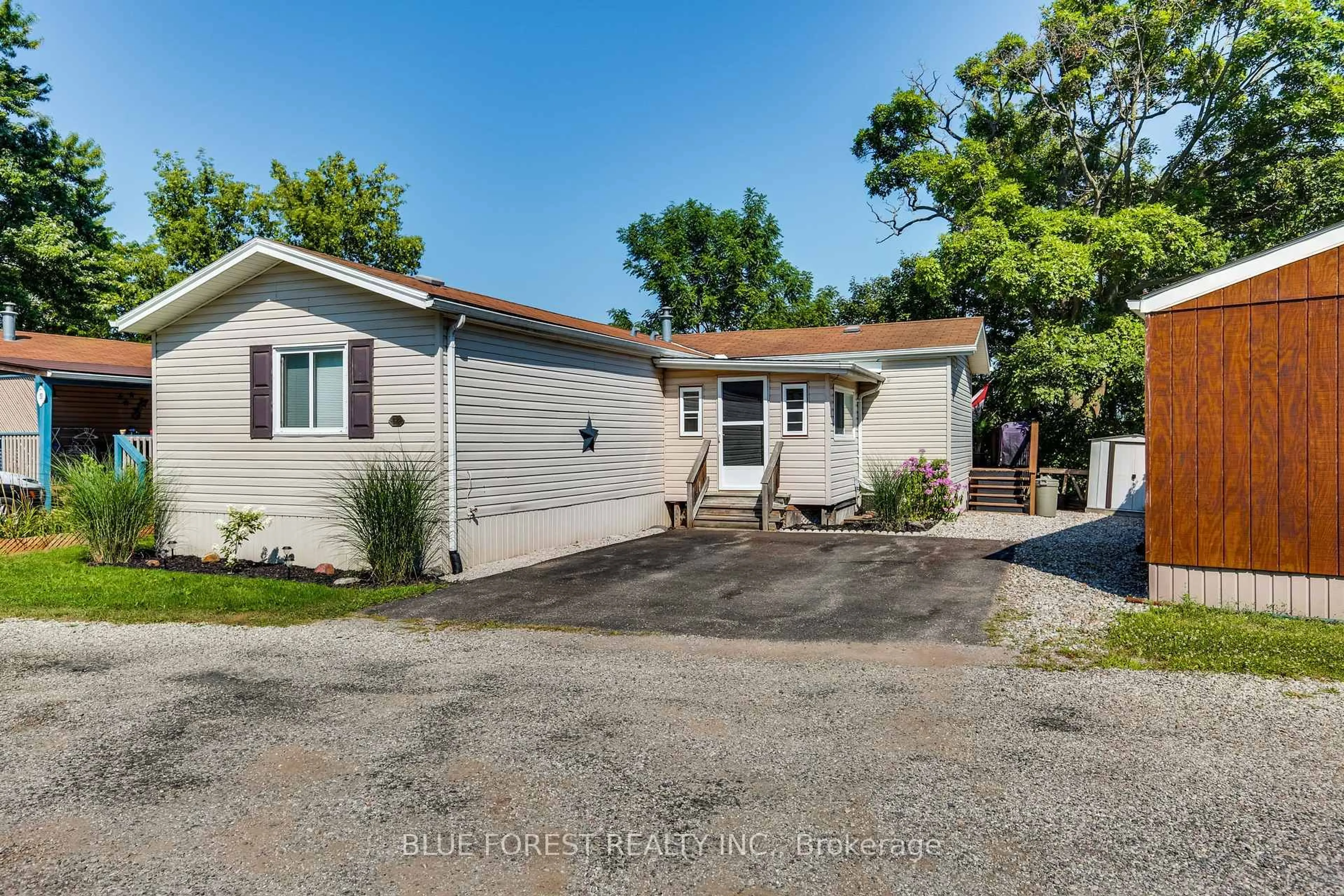 A pic from outside/outdoor area/front of a property/back of a property/a pic from drone, street for 3100 Dorchester Rd #52, Thames Centre Ontario N0L 1G5