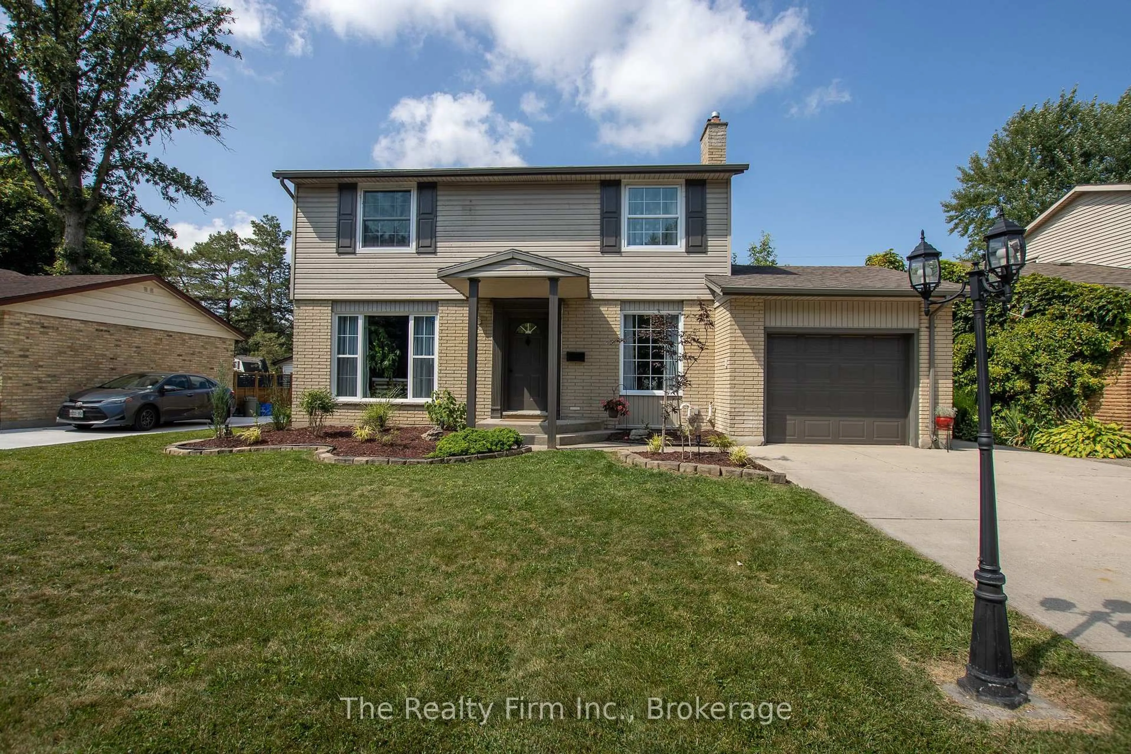 Home with brick exterior material, street for 1208 Guildwood Blvd, London North Ontario N6H 4G9